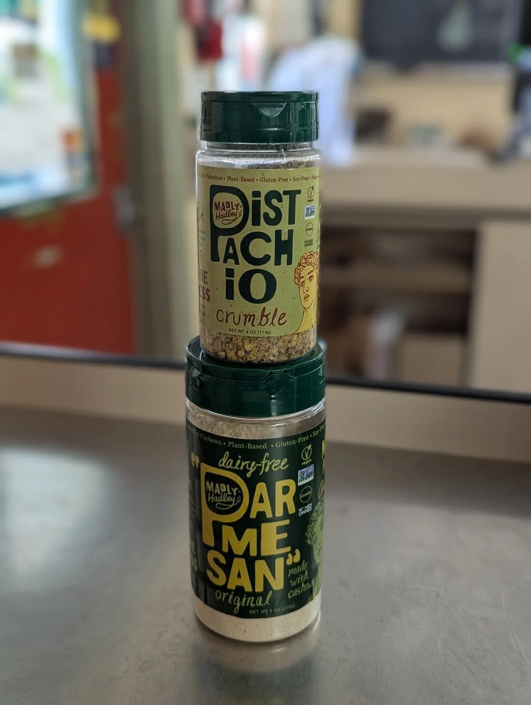 New &amp; now available at the co-op from @madlyhadleymagic
⚡ Pistachio crumble
⚡ Parmesan (made with cashews!)

Woman-owned, plant based, and gluten free!!

#potsdam_food_coop #new #inclusive_trade #woman_owned