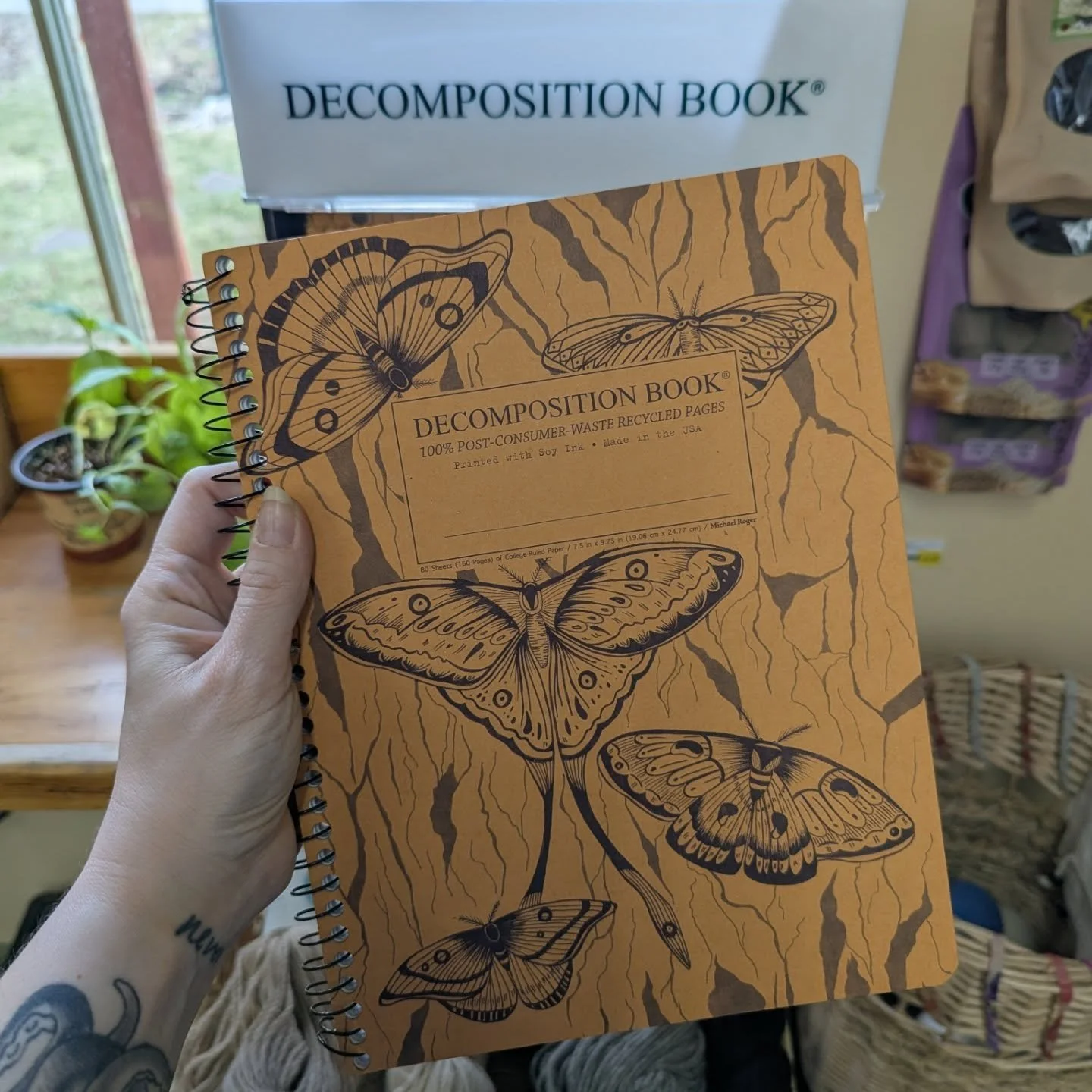 We have decomposition books back at the co-op 🤩 mini &amp; full size, with two different binding styles. Made from post-consumer-waste recycled pages ♻️.

We don't have many spaces that can accommodate the display, so it's over by the cleaning secti