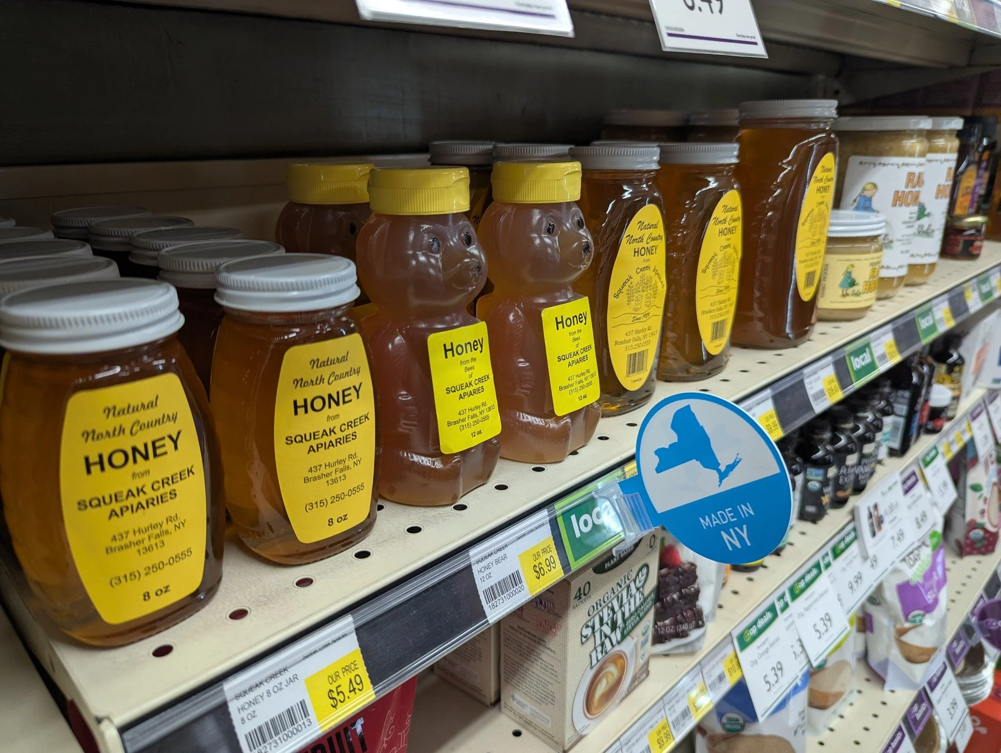 Buying locally sourced honey provides superior flavor, supports local, sustainable beekeeping, and reduces environmental impact, avoiding the adulterated, heavily processed, or imported syrups often sold in supermarkets. Local honey offers unique reg