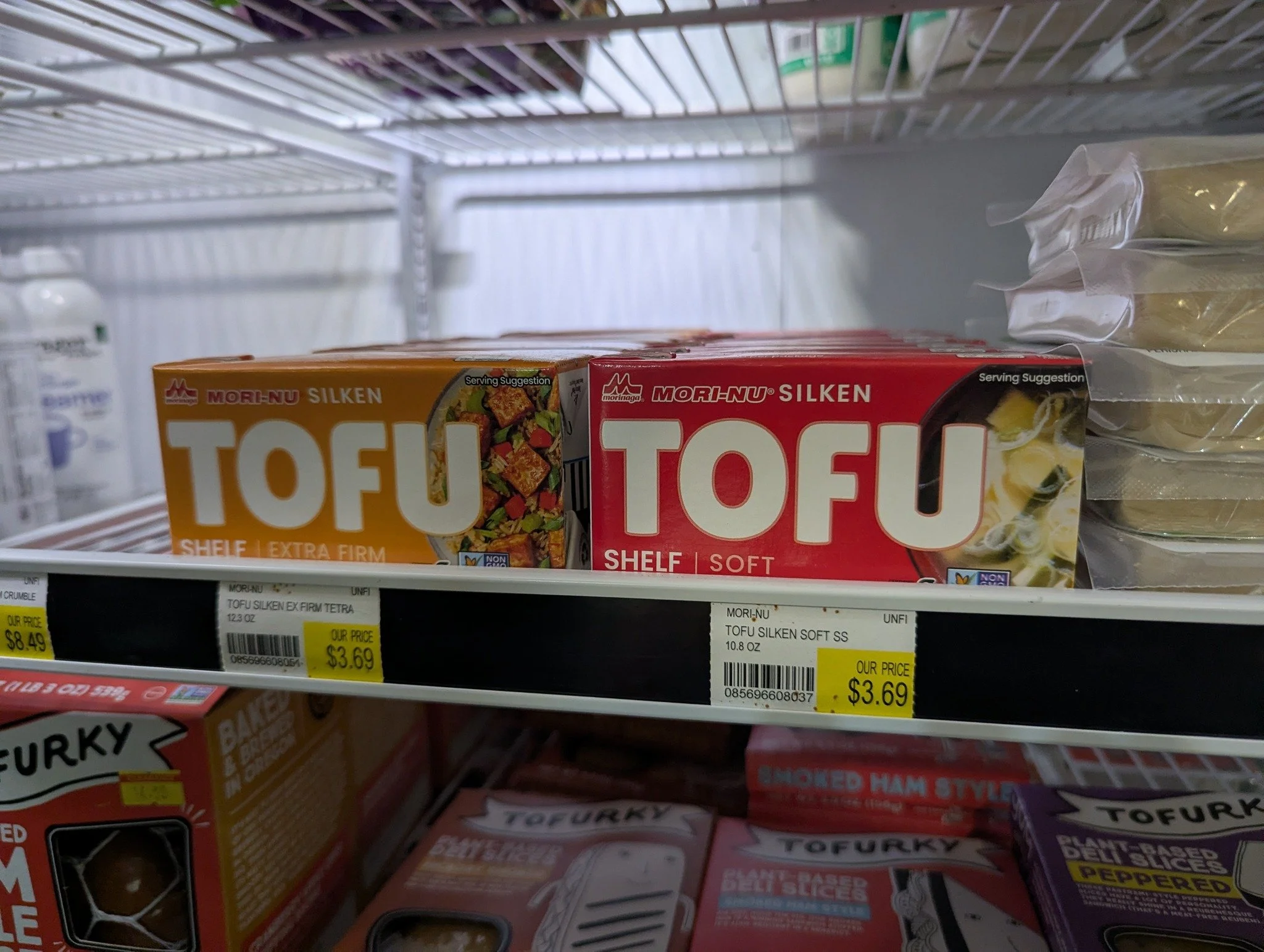 Mori Nu Silken Tofu is available at the Co-op! 
⚪Unlike traditional tofu packed in tubs of water, it is packaged in a unique aseptic box that keeps the tofu fresh for months without refrigeration or preservatives.

We only put it in the vegan cooler 