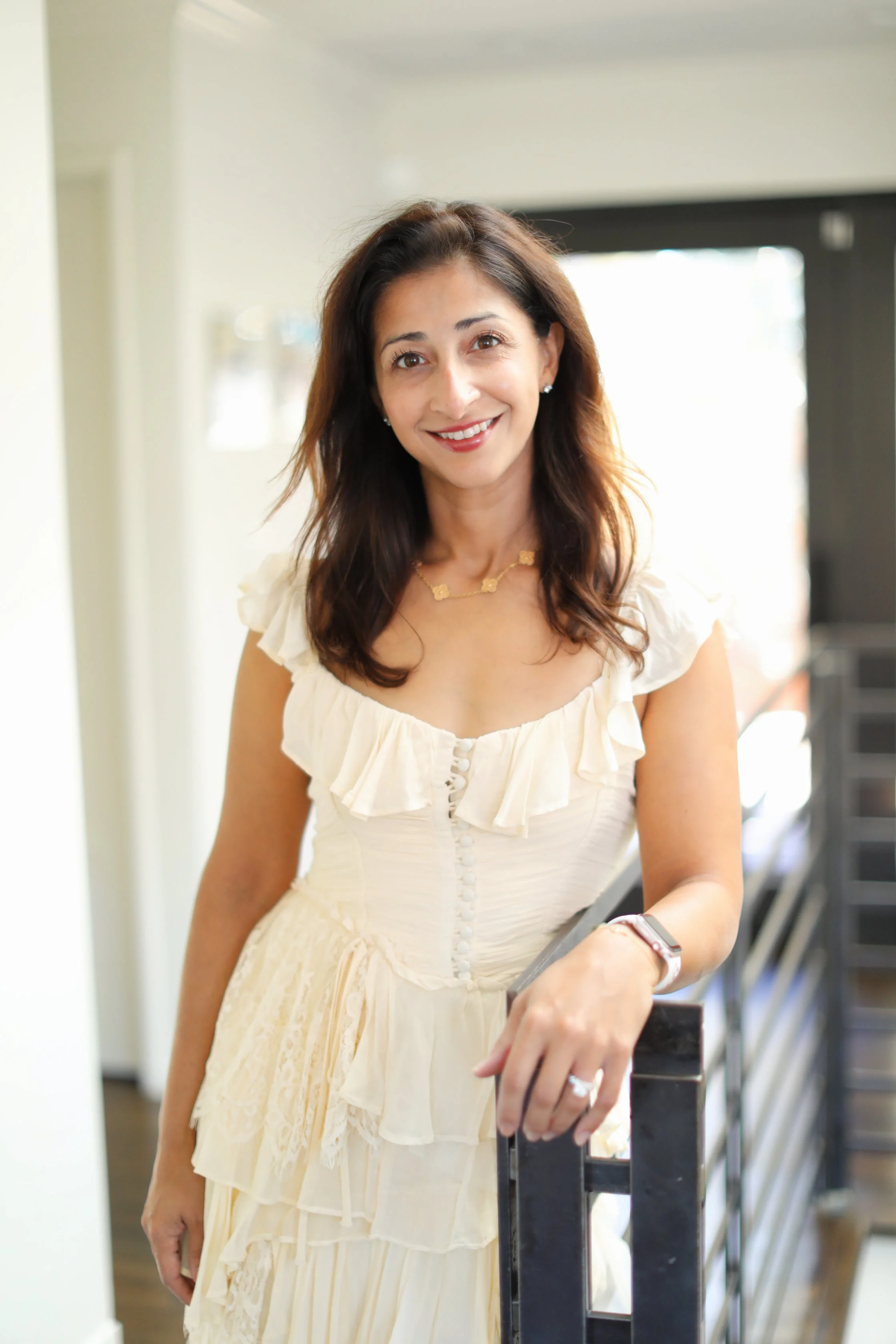 Deepti Randhava, founder of D*GLOW Holistic Consulting, offering curated resources to support women’s learning and growth.