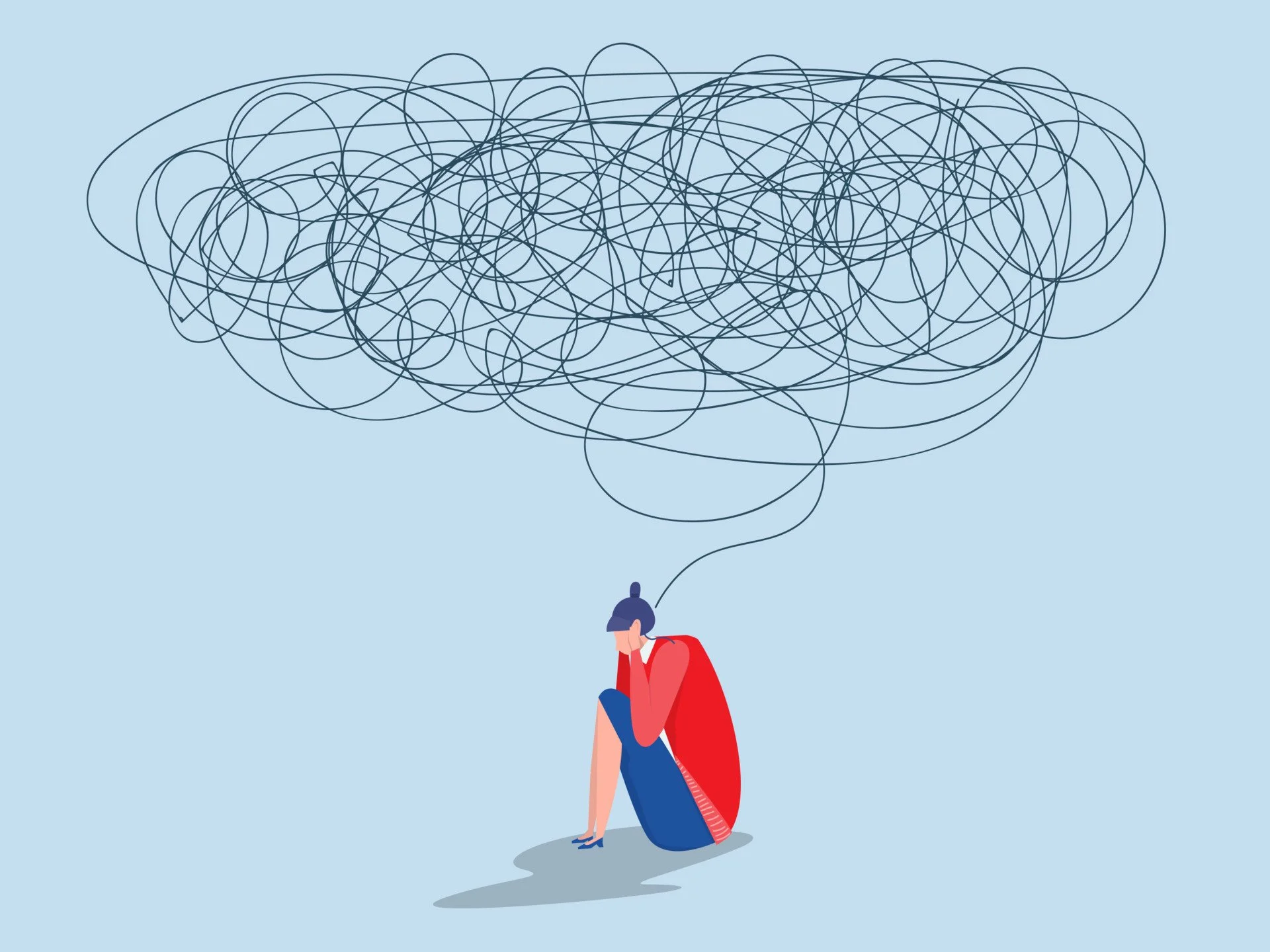 A person sitting on the ground with their knees up, holding their head in their hand, with a chaotic, scribbled thought cloud above their head.
