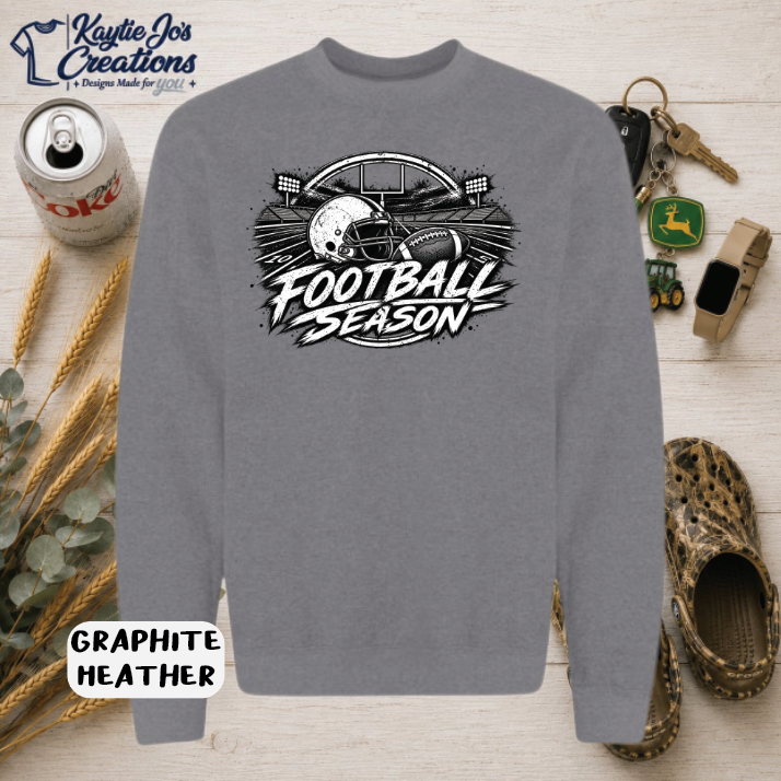Football season distressed game day design on graphite heather crewneck sweatshirt