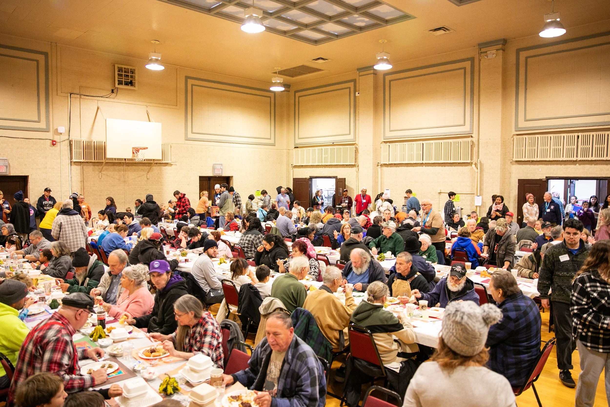 J&C - Many hands make feeding hundreds easy at LUM Thanksgiving feast