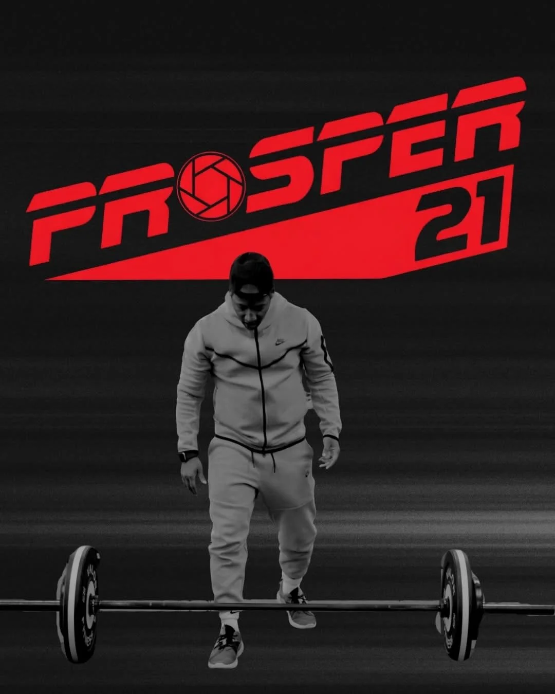 A man in a hoodie and sweatpants prepares to lift a barbell at a gym with a black-and-white color scheme, and a large red and black graphic in the background displaying the words "PRO STER 21" with a hexagon symbol inside a circle.