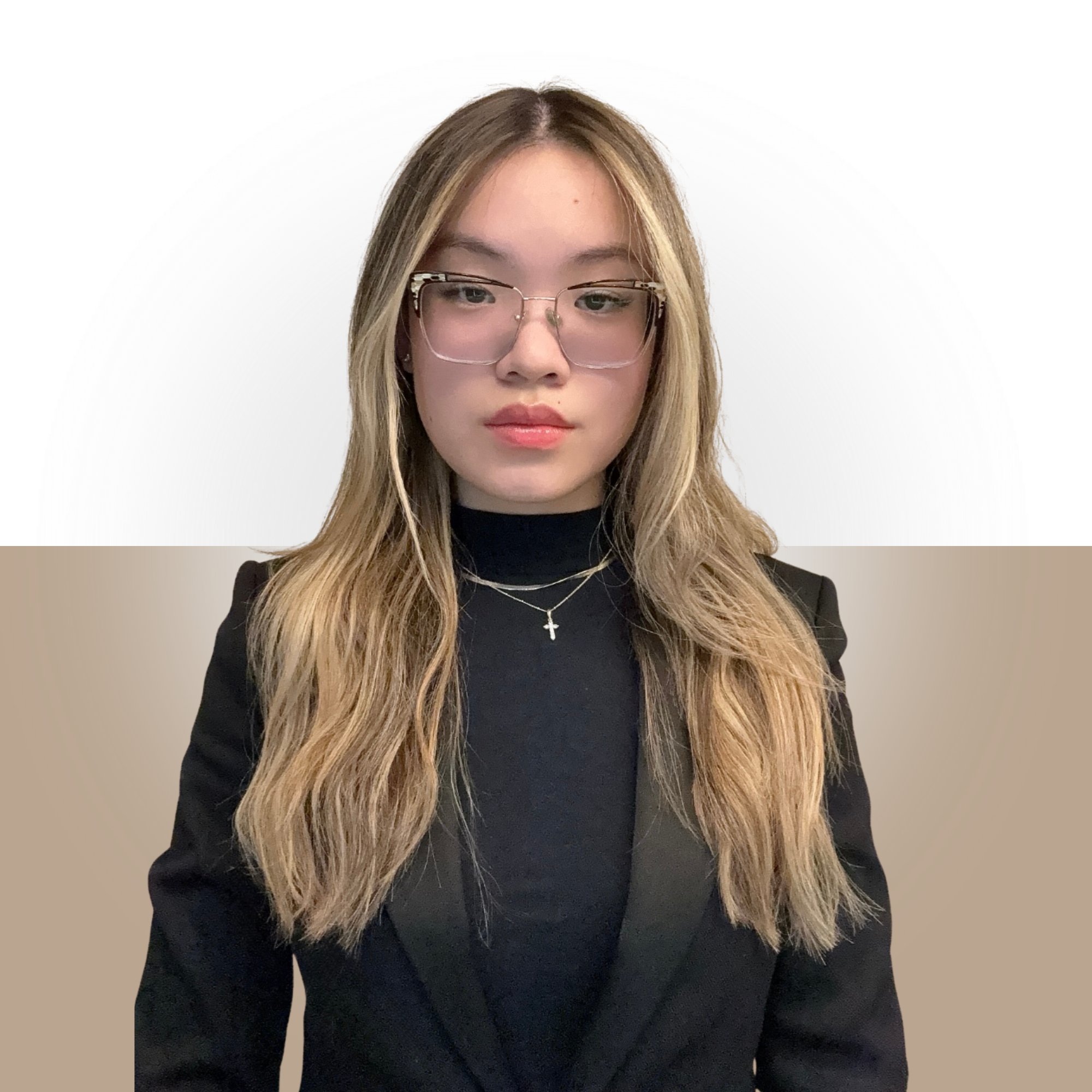 A young woman with wavy blonde hair wearing glasses, a black turtleneck, and a black blazer, standing in front of a background with a circular pattern and a beige section.