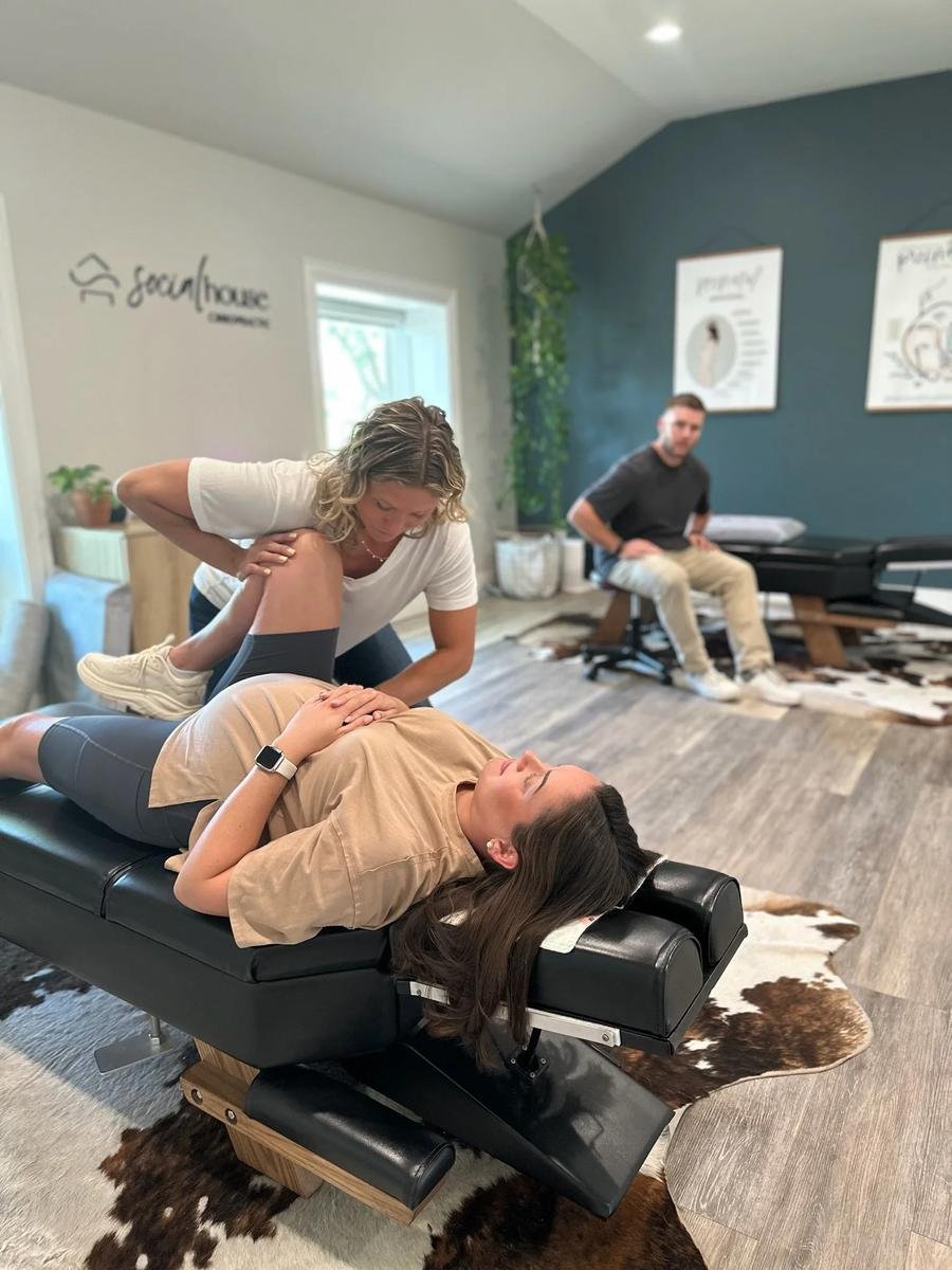 Back-lying prenatal chiropractic adjustment for round ligament pain at Social House Chiropractic in Prosper, TX. Webster Certified.