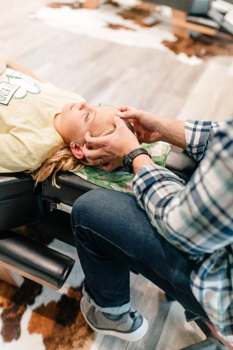 Adult cervical chiropractic adjustment at Social House Chiropractic in Prosper, TX. Care for headaches, neck pain, jaw tension, and TMJ-related concerns.