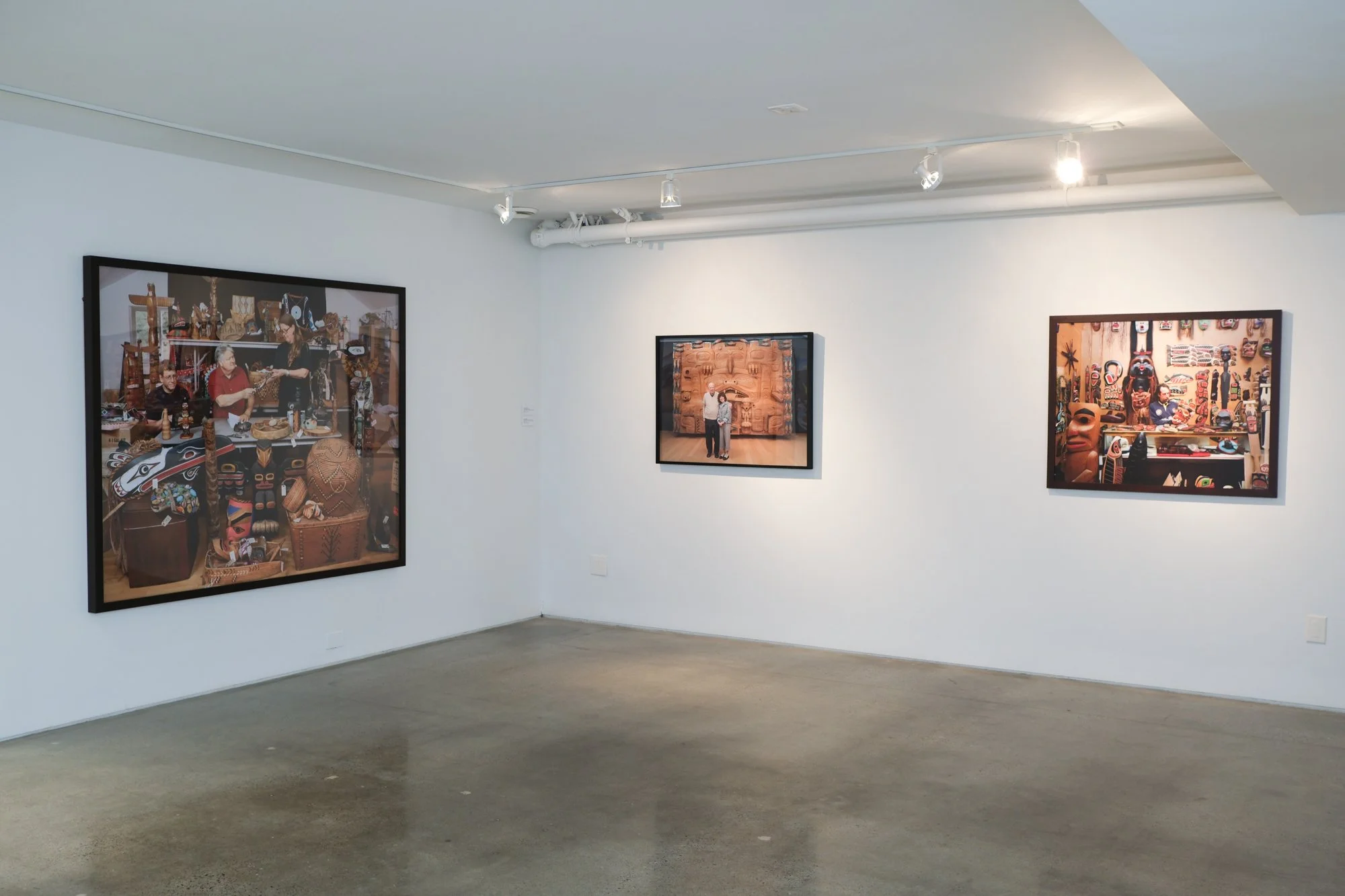 Installation view of "Christos Dikeakos: The Collectors," at Griffin Art Projects, North Vancouver, BC, 2025. Photo: Byron Dauncey, courtesy of Griffin Art Projects. (L-R)1. Lotting Preparations for Seahawk Auction, 2015; Archival pigment inks printe