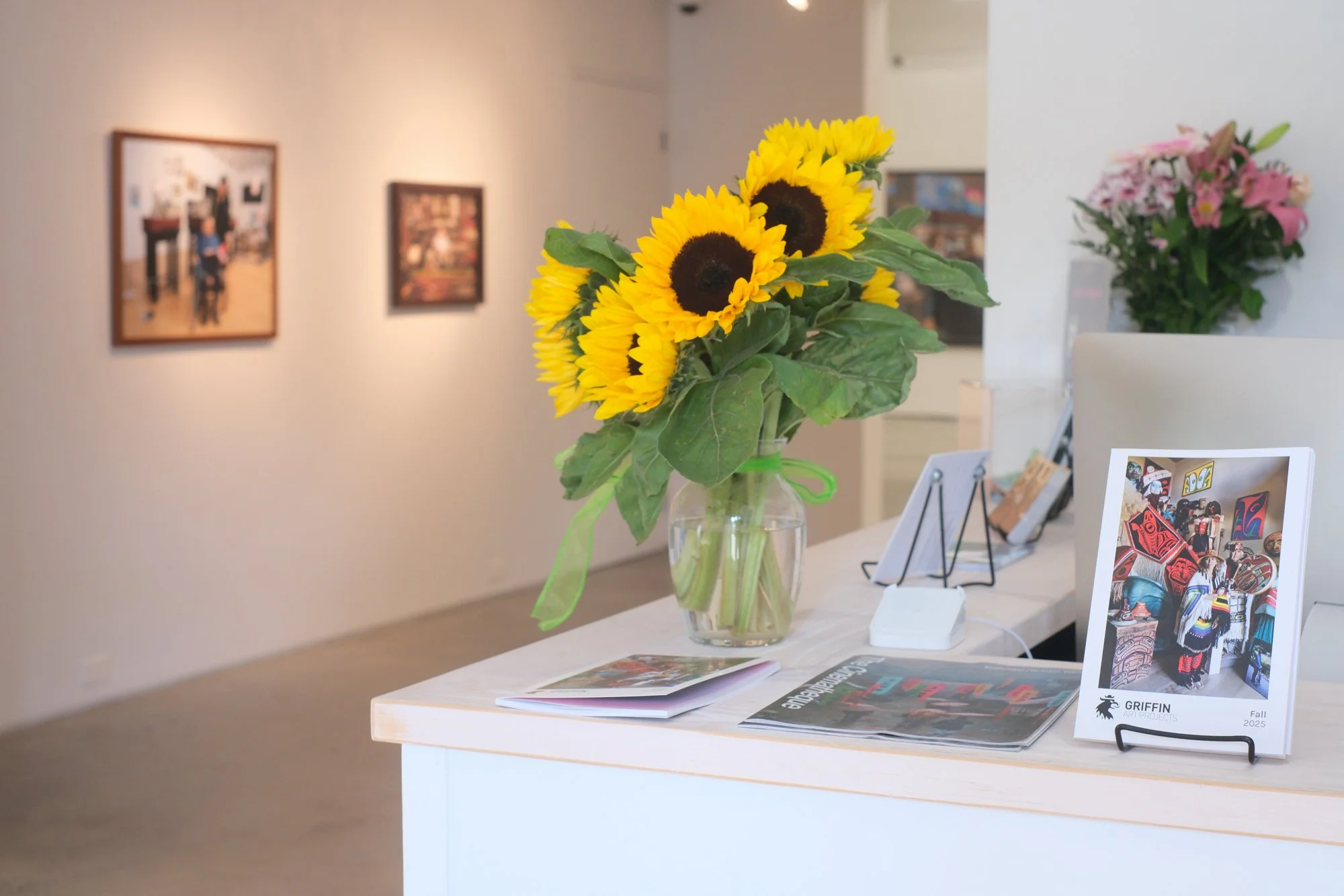 Installation view of "Christos Dikeakos: The Collectors," at Griffin Art Projects, North Vancouver, BC, 2025. Photo: Byron Dauncey, courtesy of Griffin Art Projects. (L-R)1. Dr. Wallace Chung and Sarah Ling at the Chinese Canadian Museum, 2025; Archi