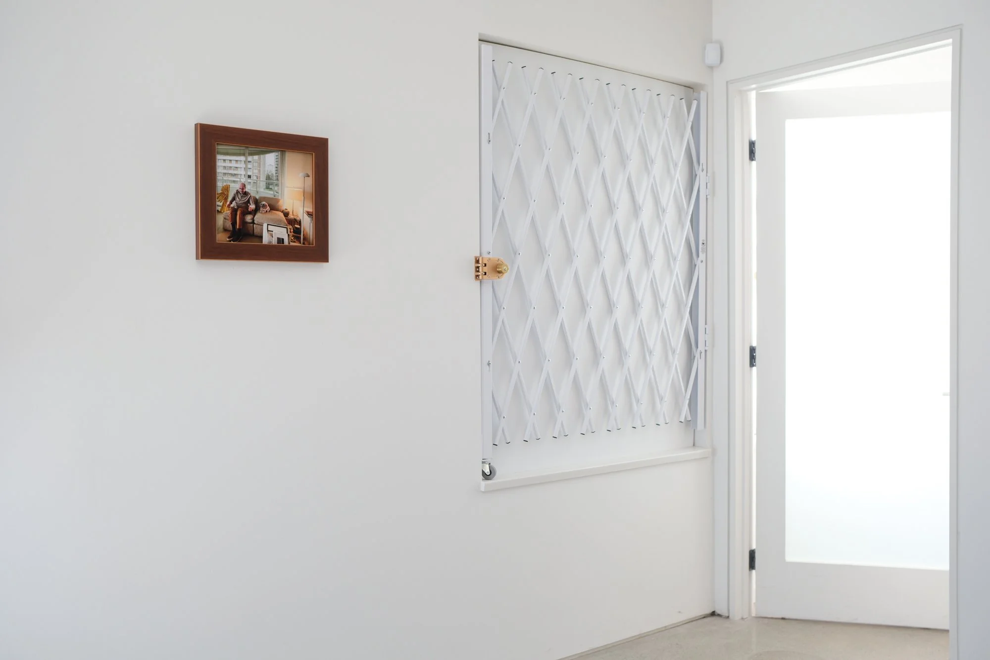 Installation view of "Christos Dikeakos: The Collectors," at Griffin Art Projects, North Vancouver, BC, 2025. Photo: Byron Dauncey, courtesy of Griffin Art Projects. My First Warhol, 2020; Archival pigment inks printed on Epson lustre paper; 11  x 12