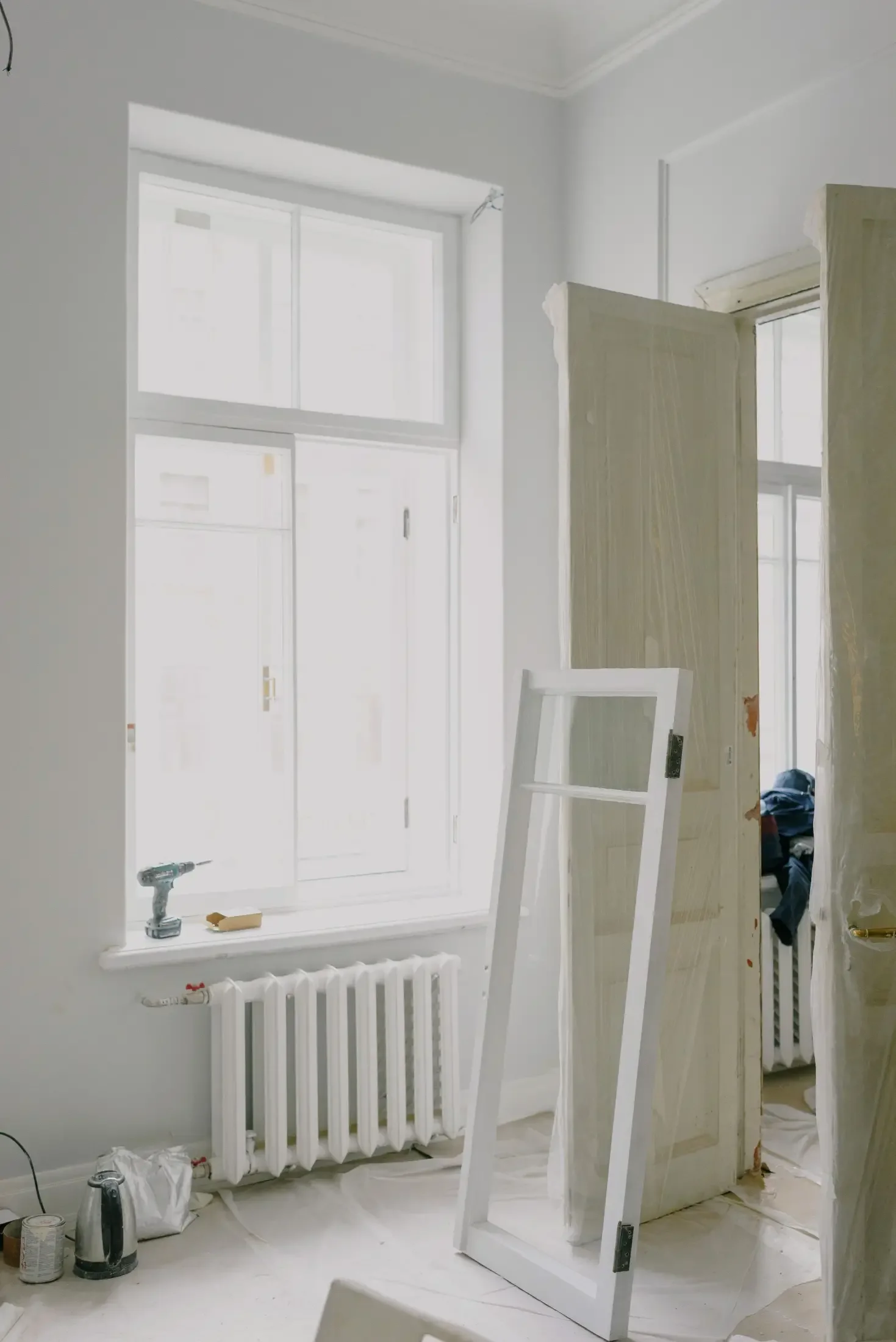 A room in the house getting renovated with new windows and closet doors