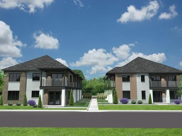 Digital rendering of two modern duplex homes with brown and gray exteriors, front yards with purple bushes, green lawns, and a clear blue sky with clouds.