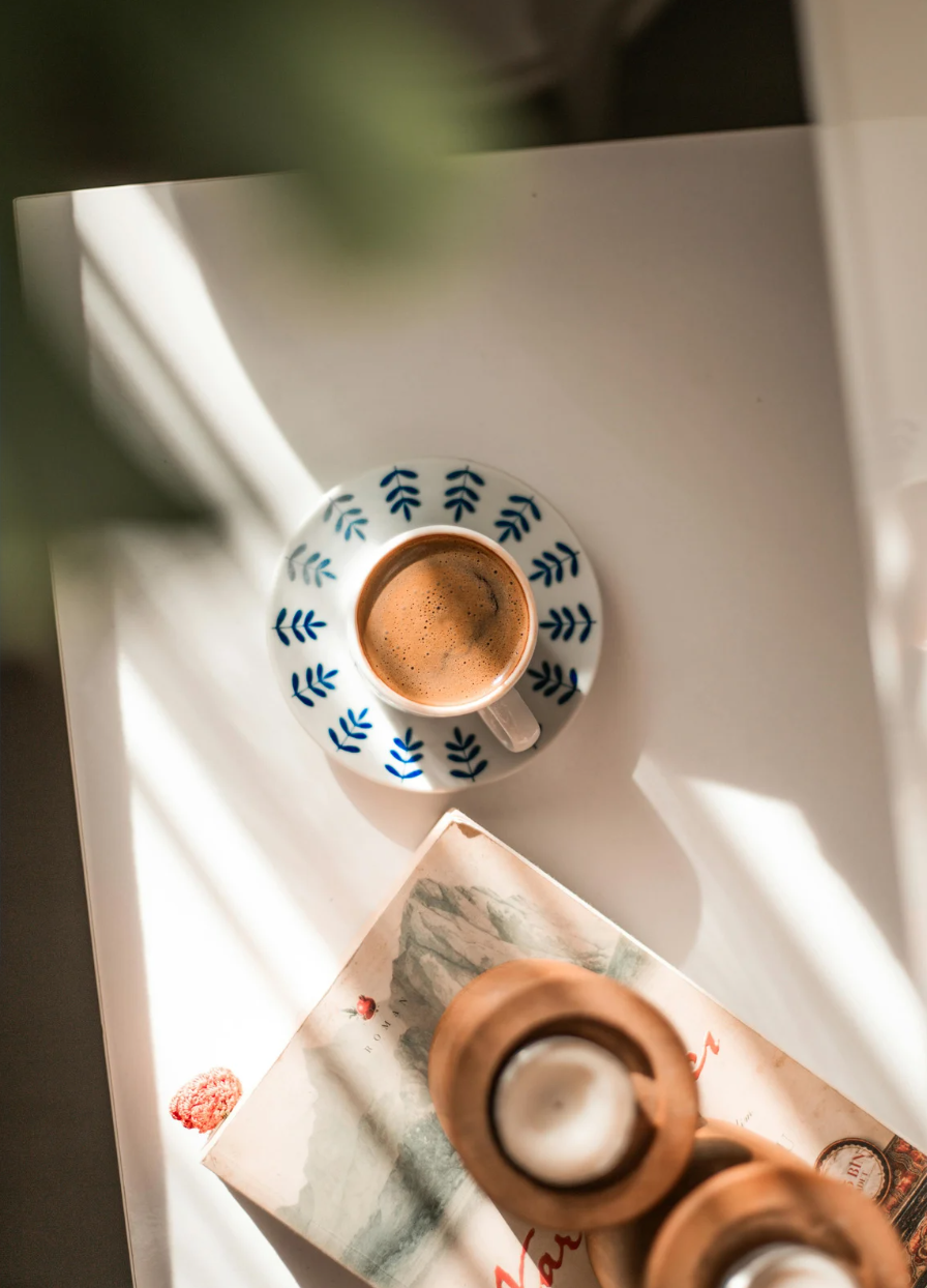 Calm setting with coffee, representing a welcoming space to begin therapy and reach out for support