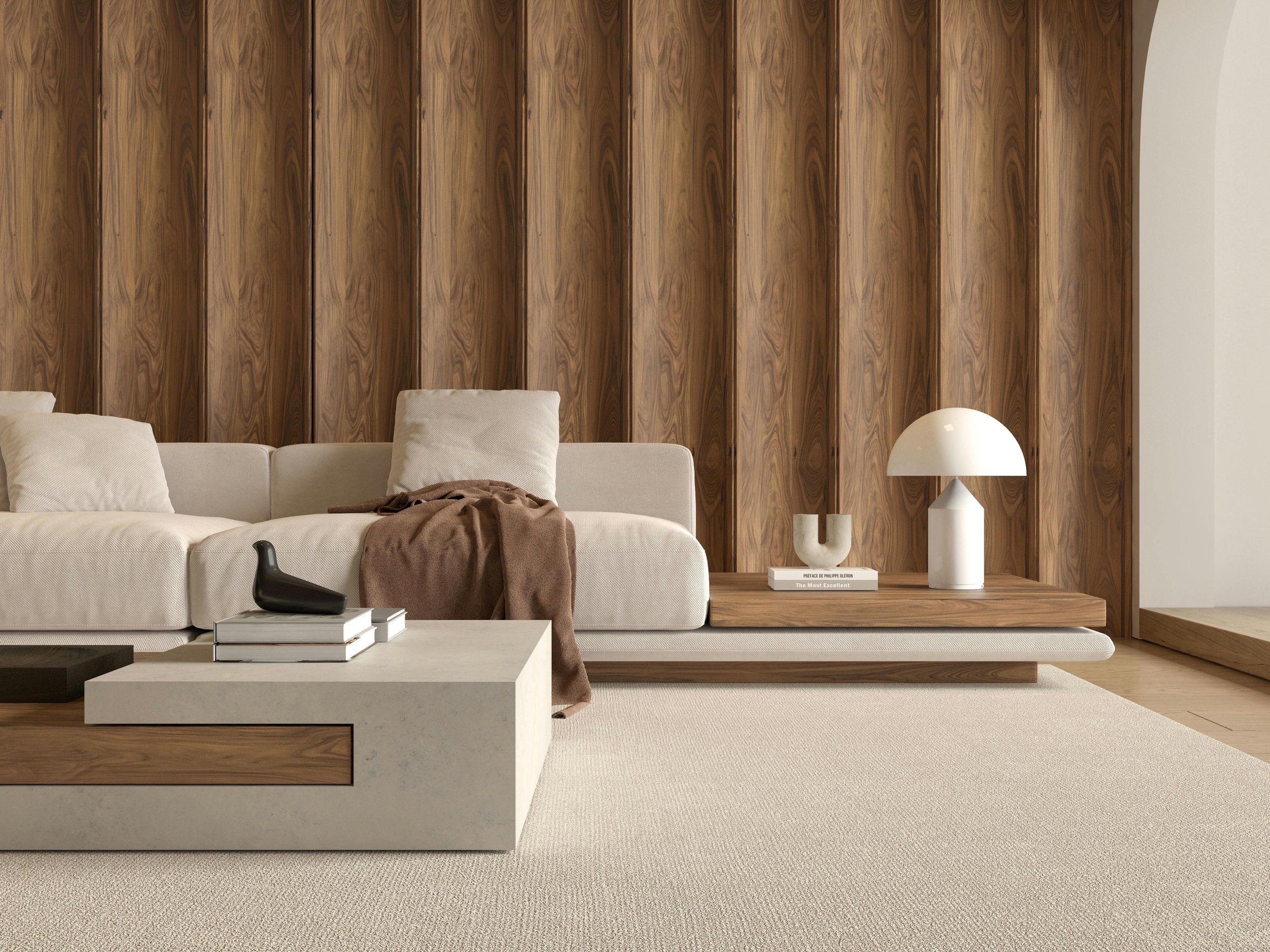 Salon moderne avec canapé beige, table basse en béton, lampe blanche, et mur en bois