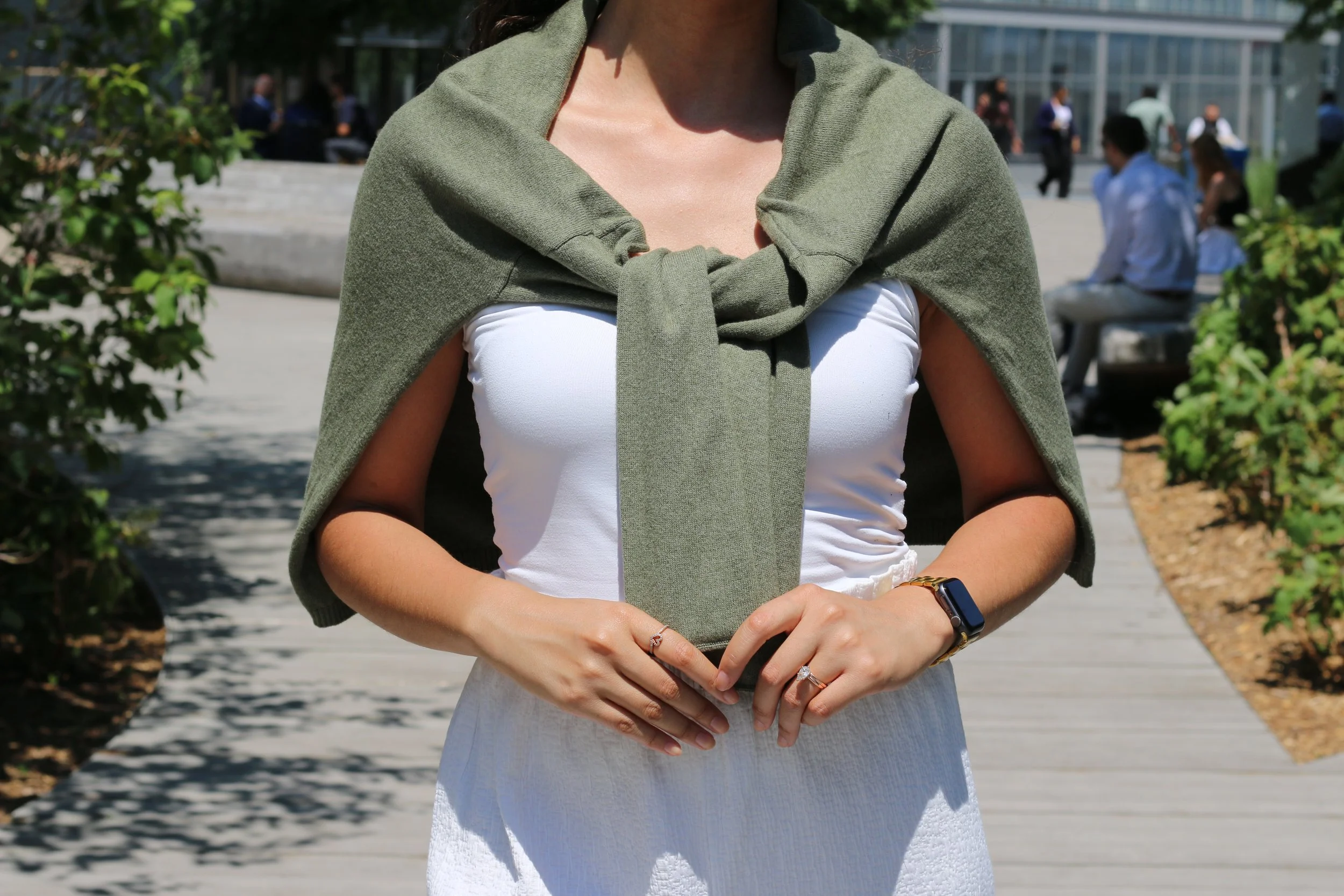 Olive green boxy-fit women’s knit cardigan, loose relaxed fit, made from sustainable wool and cotton blend
