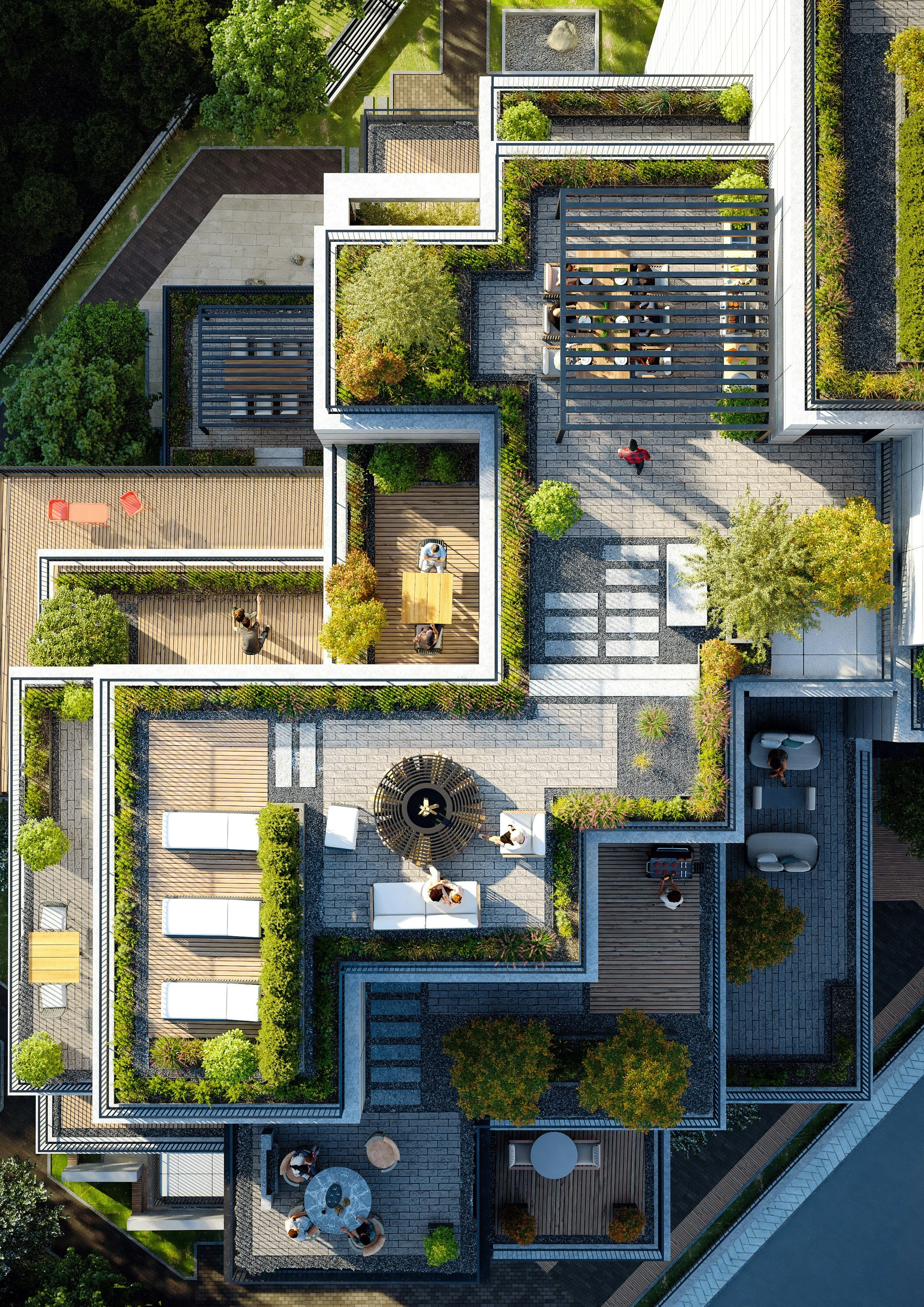 Aerial view of a modern residential building with rooftop outdoor space.