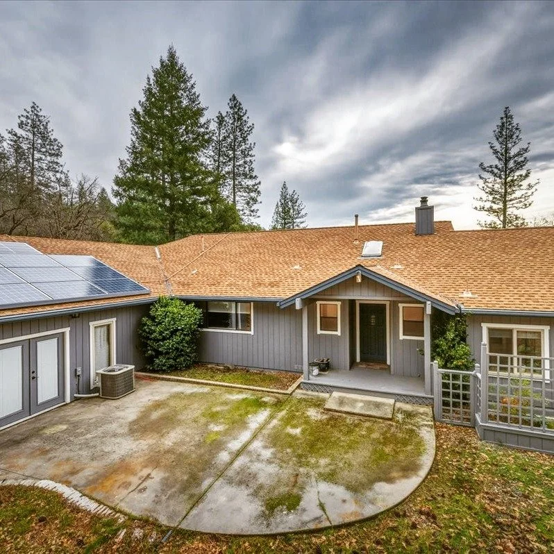 🌲 Nearly 5 private acres + mountain views 🌲

Wake up surrounded by pines and oaks, soak in expansive treetop views, and enjoy true Sierra Foothills living&mdash;just minutes from town. This single-story retreat features an open-concept layout, sun-