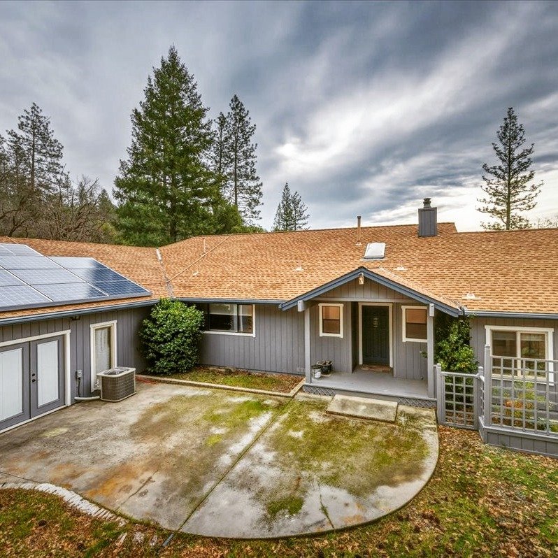 🌲 Nearly 5 private acres + mountain views 🌲

Wake up surrounded by pines and oaks, soak in expansive treetop views, and enjoy true Sierra Foothills living&mdash;just minutes from town. This single-story retreat features an open-concept layout, sun-