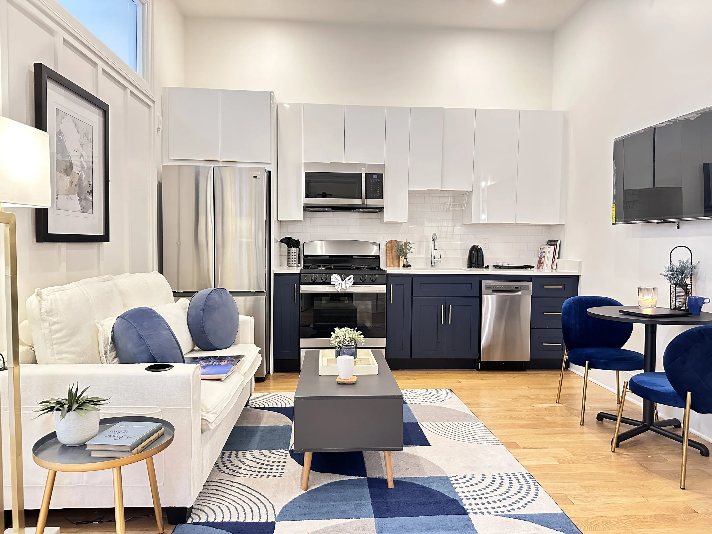 Open-concept 1 bedroom short-term rental living space optimized for guest experience and higher rental income performance