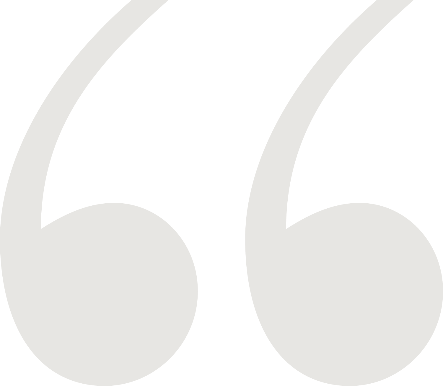 Close-up of large gray quotation marks.