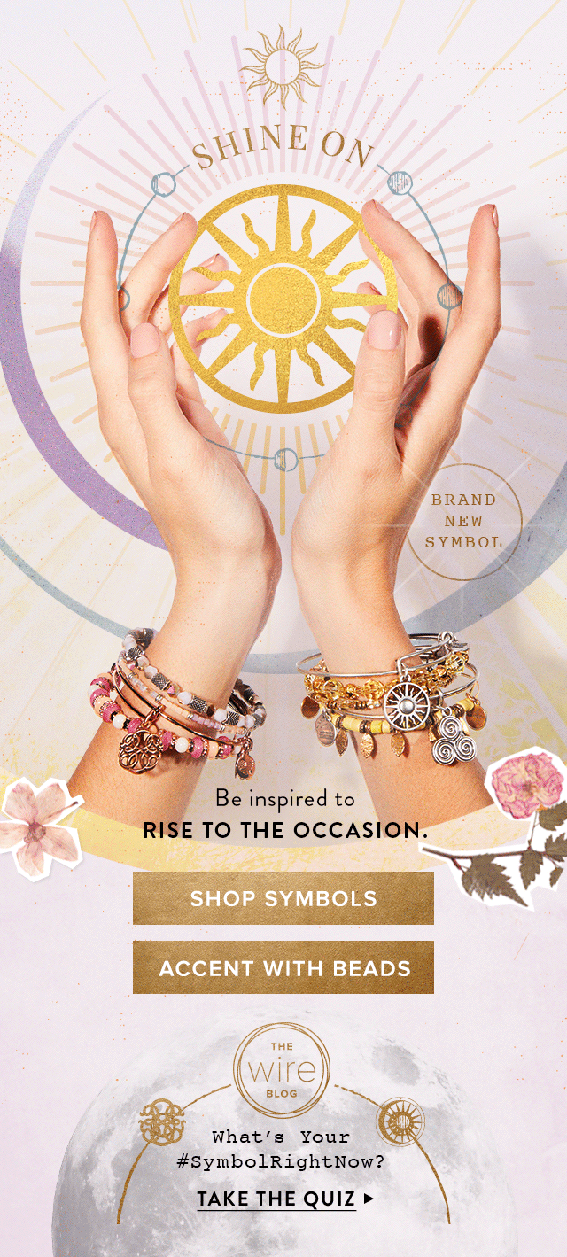 Two hands with jewelry are shown, one with pink and white beads and the other with gold and bronze beads, both holding a golden sun symbol in the background. The image promotes jewelry with symbols and beads, featuring the text 'Shine On,' 'Brand New