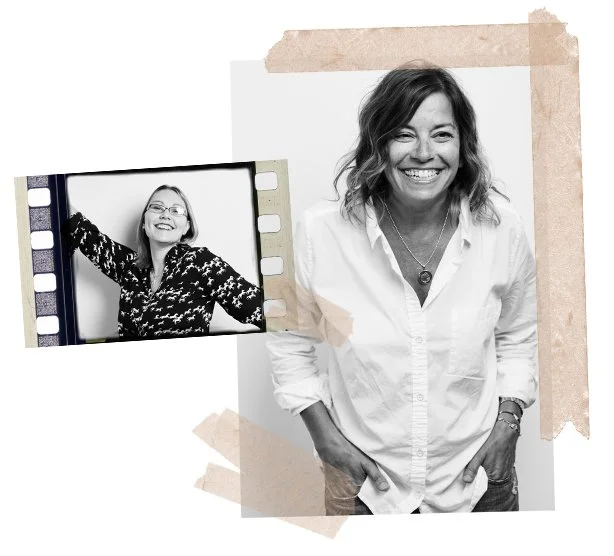 A woman stands smiling with her hands in her pockets, wearing a white shirt, and a framed photo of herself is displayed next to her showing her in a patterned top, also smiling, with a filmstrip border.