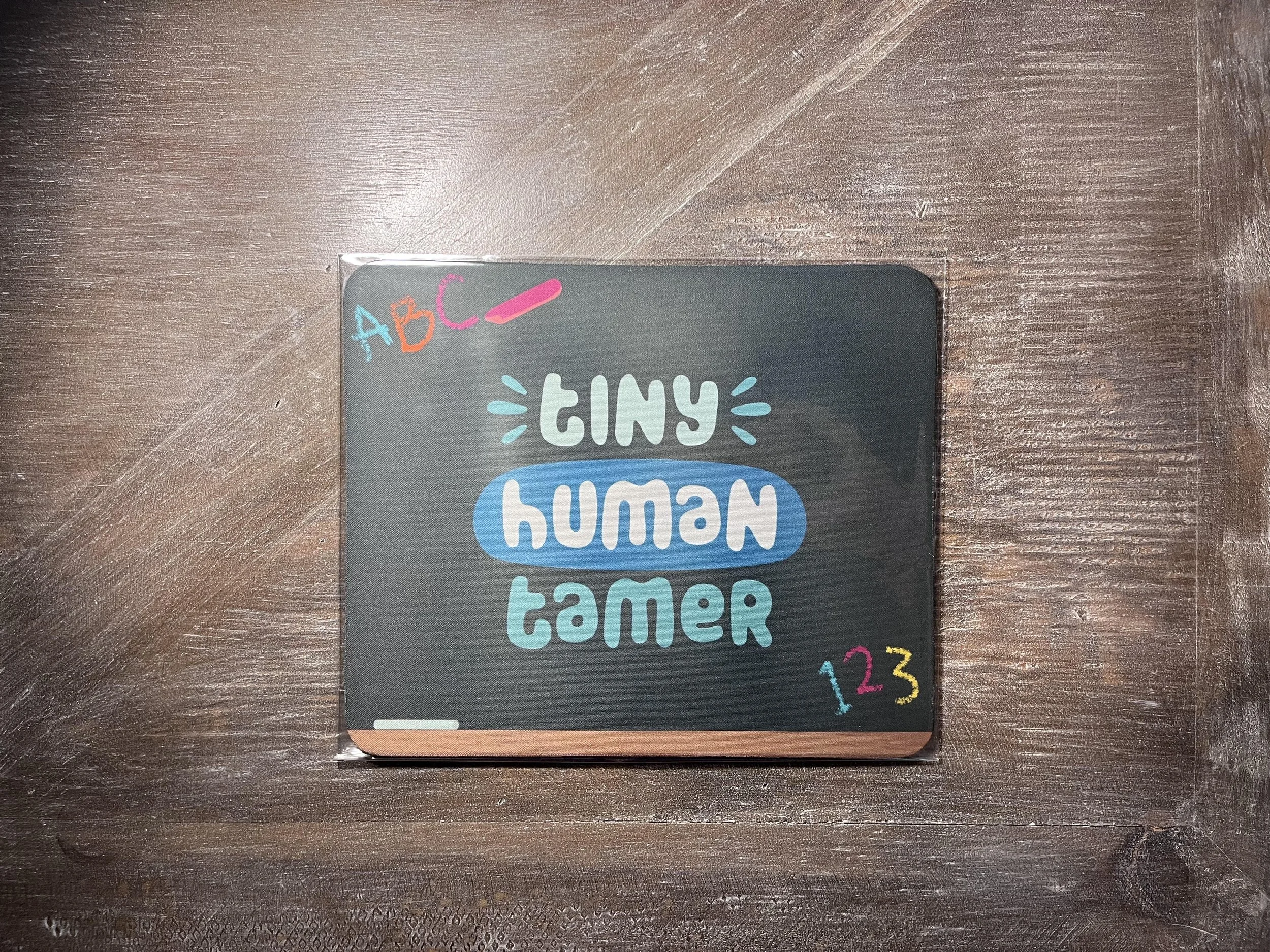 Tiny Human Tamer Mouse Pad