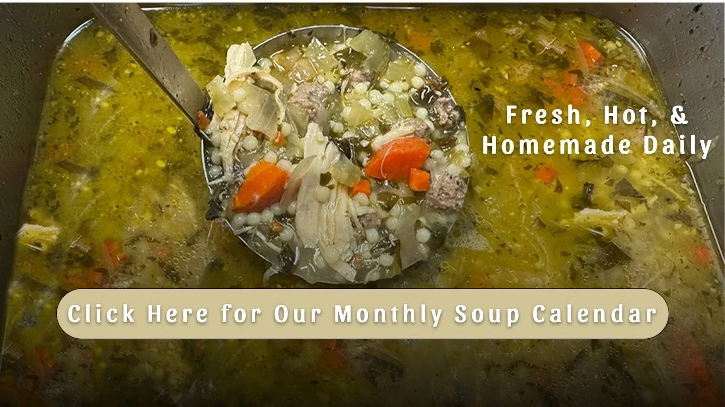 A pot of homemade chicken soup with vegetables like carrots, celery, and black pepper, with a ladle scooping out some soup, accompanied by text advertising homemade, fresh, hot soup.