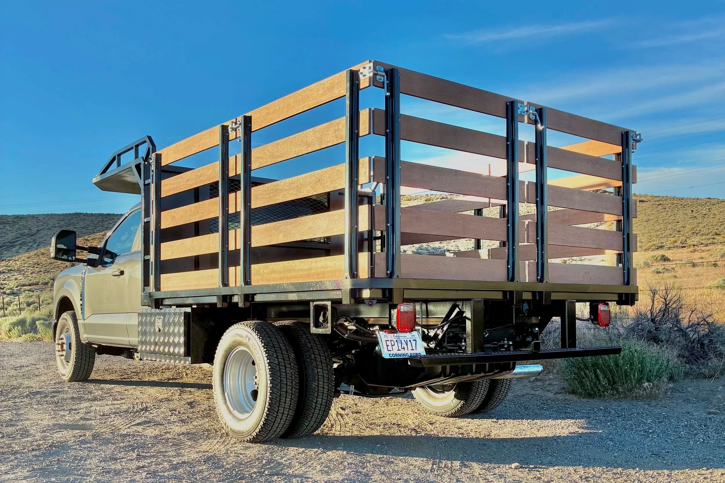 Stake Bed, 2026. Design, fabrication, coating, and installation of a custom flat bed with stake sides on a 2026 F350 Super Duty Cab Chassis.