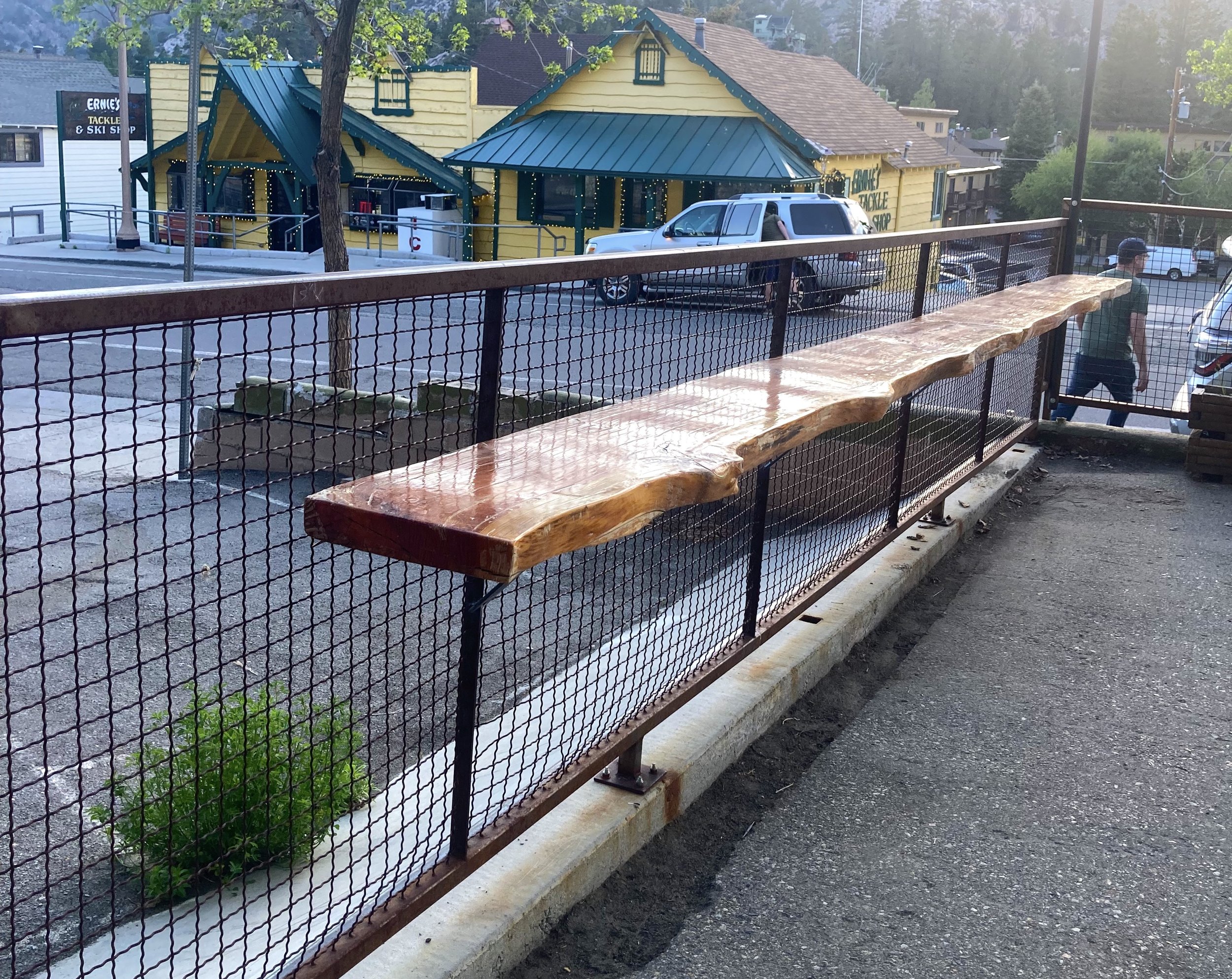 Countertop on existing railing, commercial, June Lake, CA, 2024. Scope: design, fabrication, and installation. Wood slab by others.