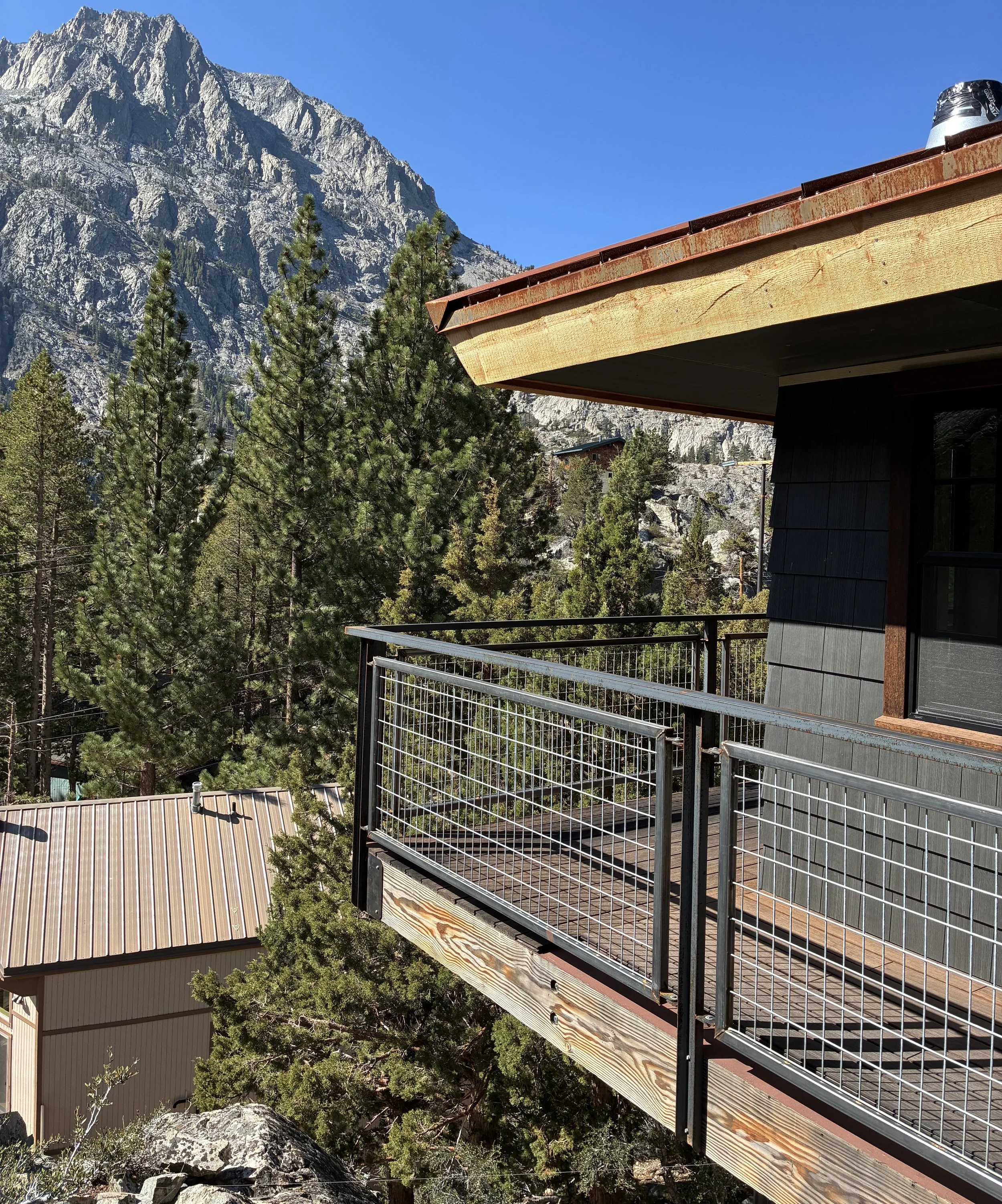 Guardrail, steel channel and welded wire mesh, residential, June Lake, CA, 2025. Scope: design, fabrication, and install.