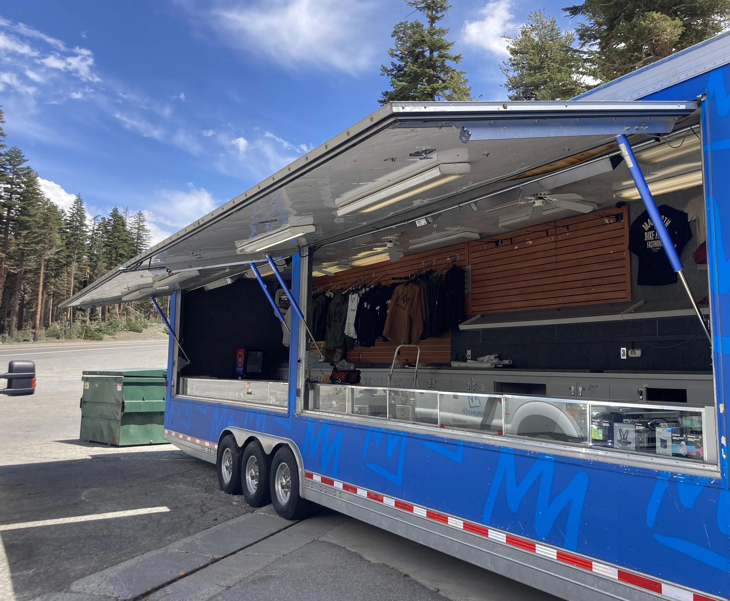 Motorized Lifts for Retail Trailer Door. Completed under employment at Mammoth Mountain Ski Area. Scope: mechanical design, electrical design, fabrication, and installation of a system of electric linear actuators to open and close the doors of a ret