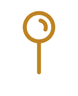 A gold-colored key with a circular handle
