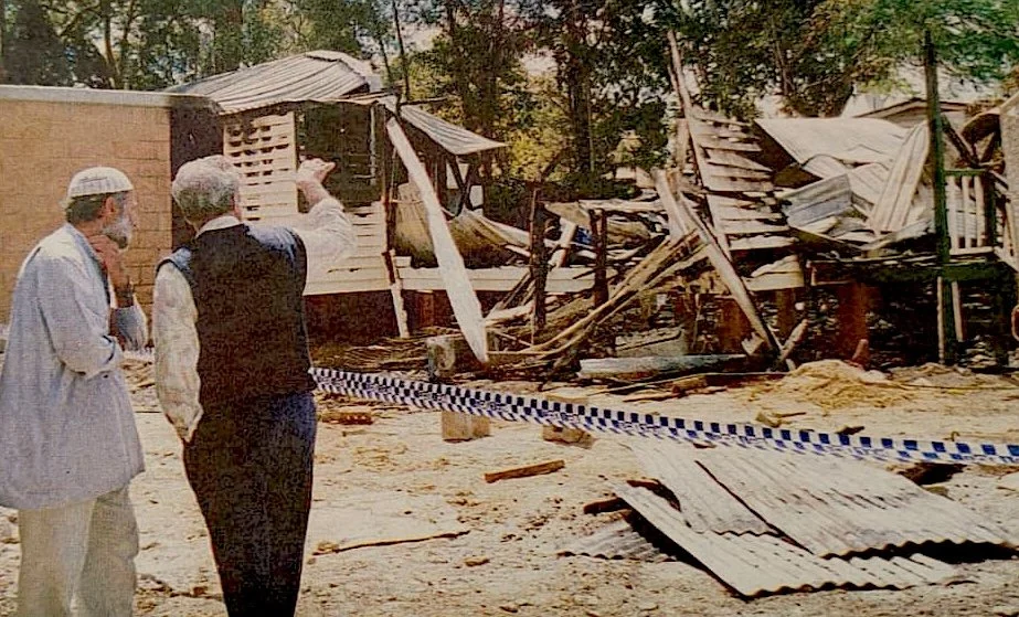 Mosque officials survey fire damage