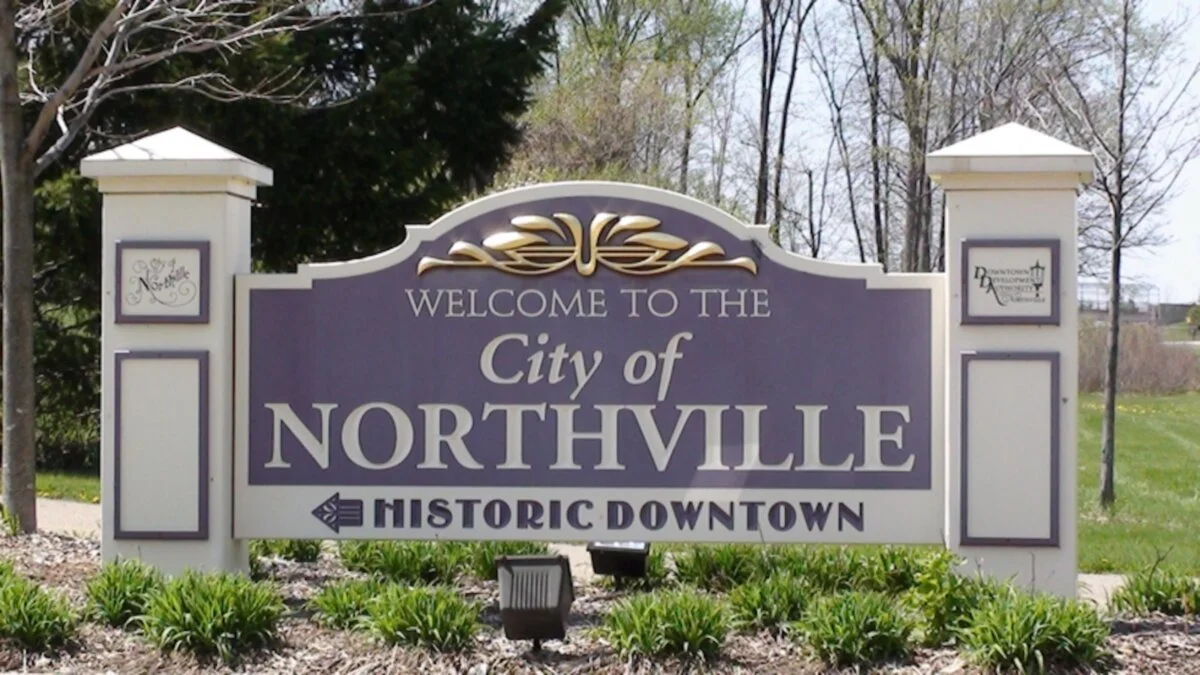 Welcome sign for the City of Northville, indicating its historic downtown area.
