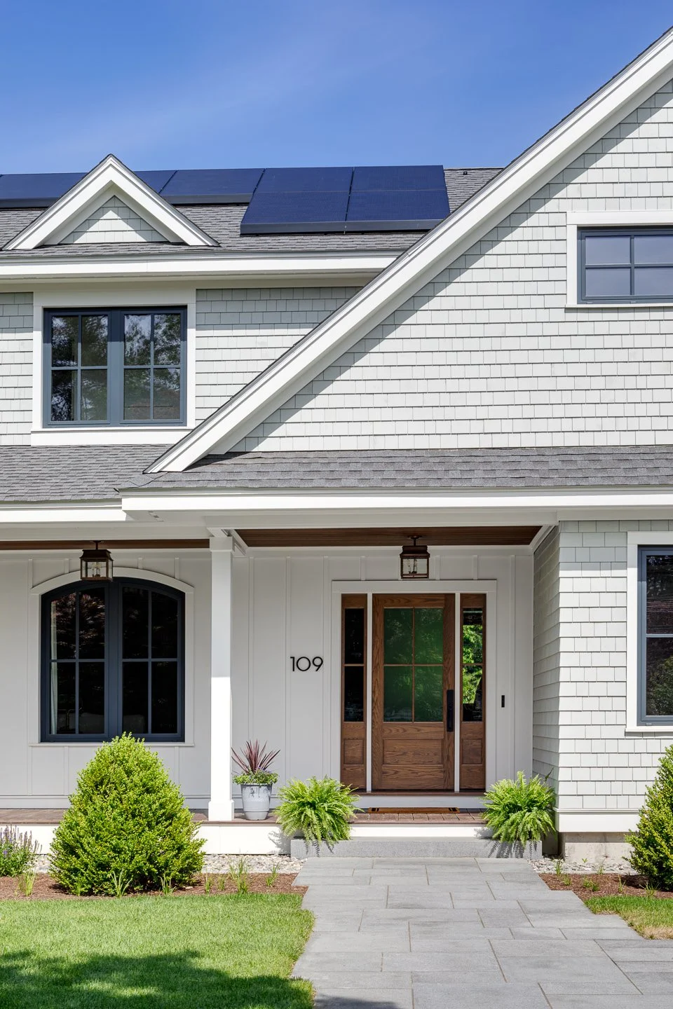 Best general contractor, home builder, and home remodeler on the Northshore in Andover, Massachusetts (MA), developed this modern energy efficient farmhouse with Tesla batteries and solar panels.