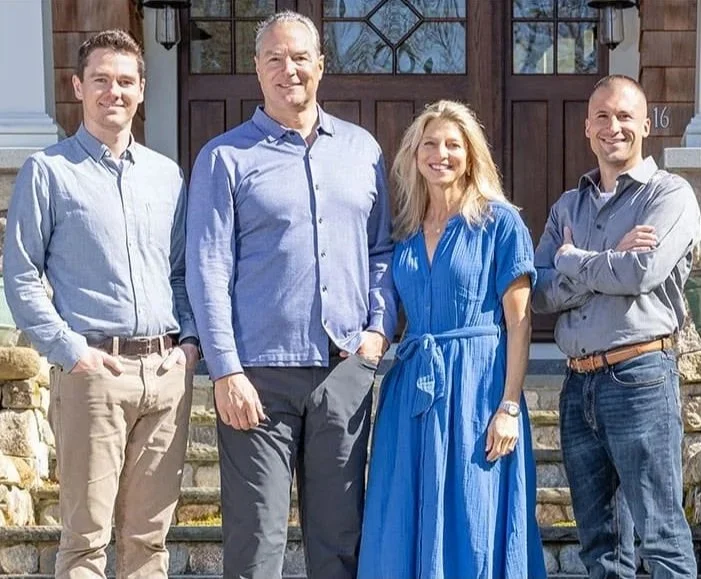 Howell Custom Building Group's Director of Preconstruction, Garrett Moynihan, husband-and-wife co-founders Steve and Susan Howell, and Scott Graham, Director of Construction.