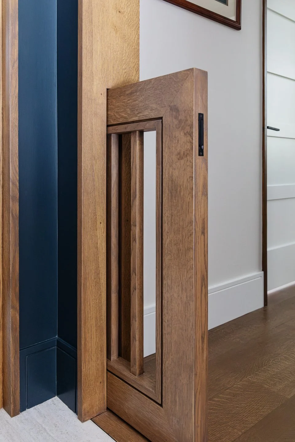 Best general contractor, home builder, and home remodeler on the Northshore in Andover, Massachusetts (MA), developed this built in sliding dog gate.