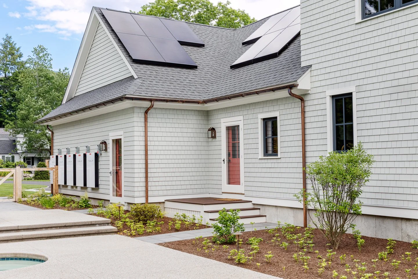 Best general contractor, home builder, and home remodeler on the Northshore in Andover, Massachusetts (MA), developed this modern energy efficient and hih pergformance house with Tesla batteries and rooftop solar panels. 