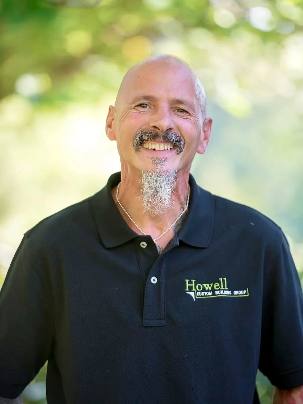 A headshot of Emile Bryson, a carpenter at Howell Custom Building Group.