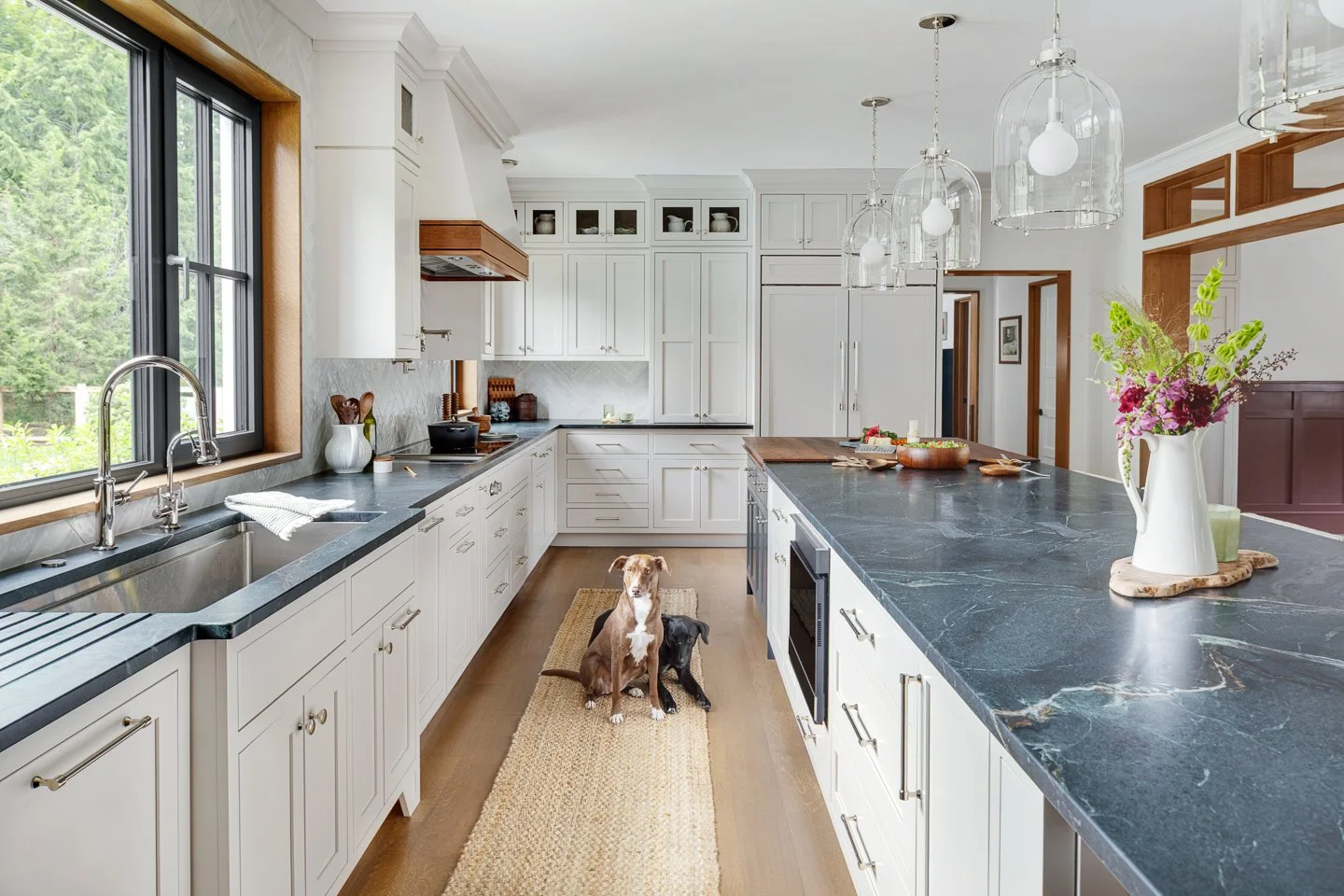 Best general contractor, home builder, and home remodeler on the Northshore in Andover, Massachusetts (MA), developed this modern energy efficient farmhouse with Tesla batteries and solar panels.