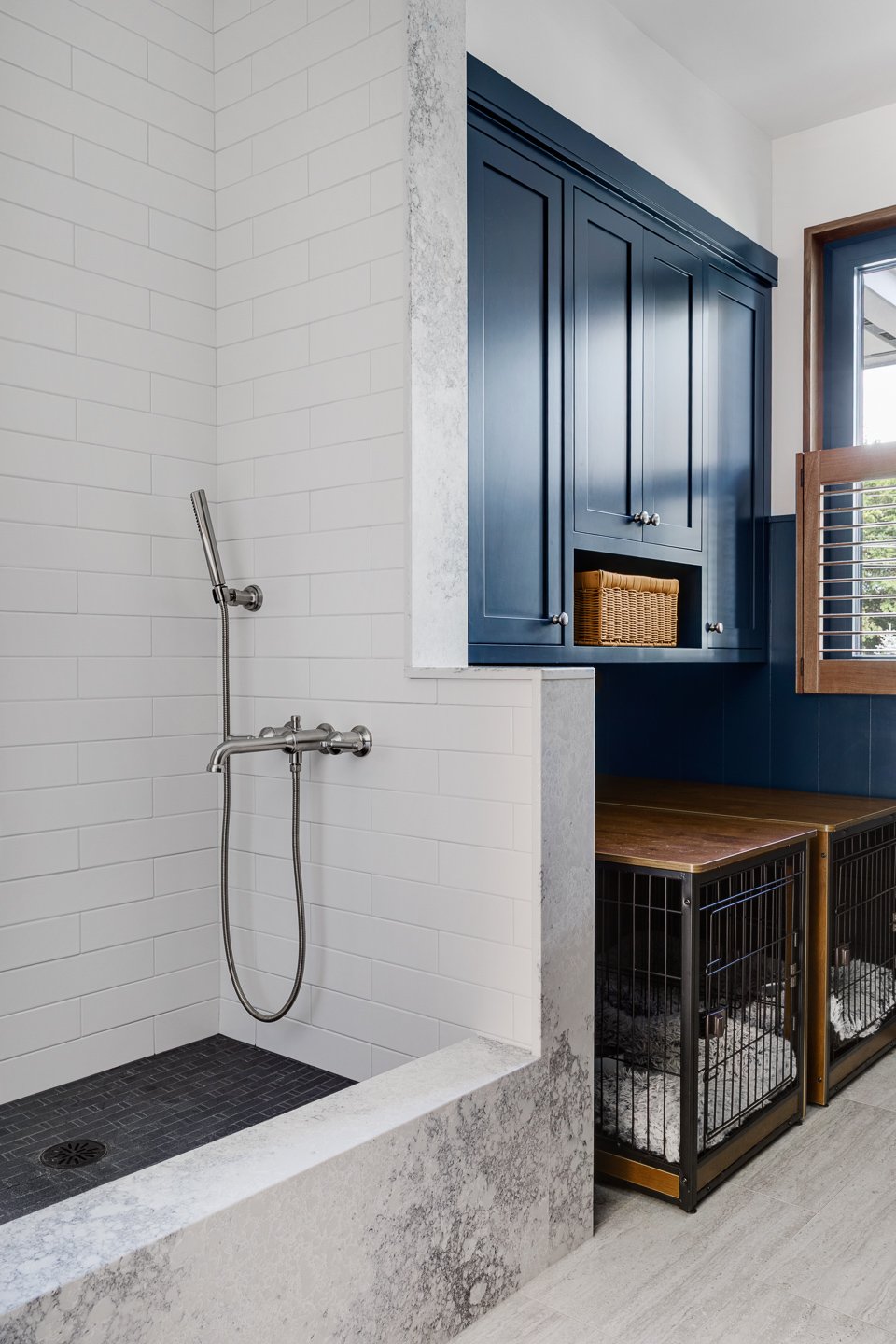 Best general contractor, home builder, and home remodeler on the Northshore in Andover, Massachusetts (MA), developed this modern mudroom and custom washroom for dogs and pets.