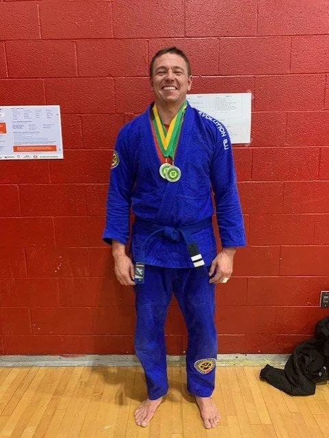 Kirk Kendall with medals