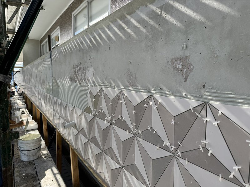 Progress shot of new tiles being installed