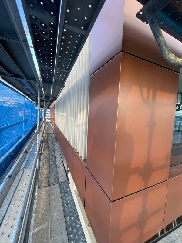 View of new orange-coloured cladding