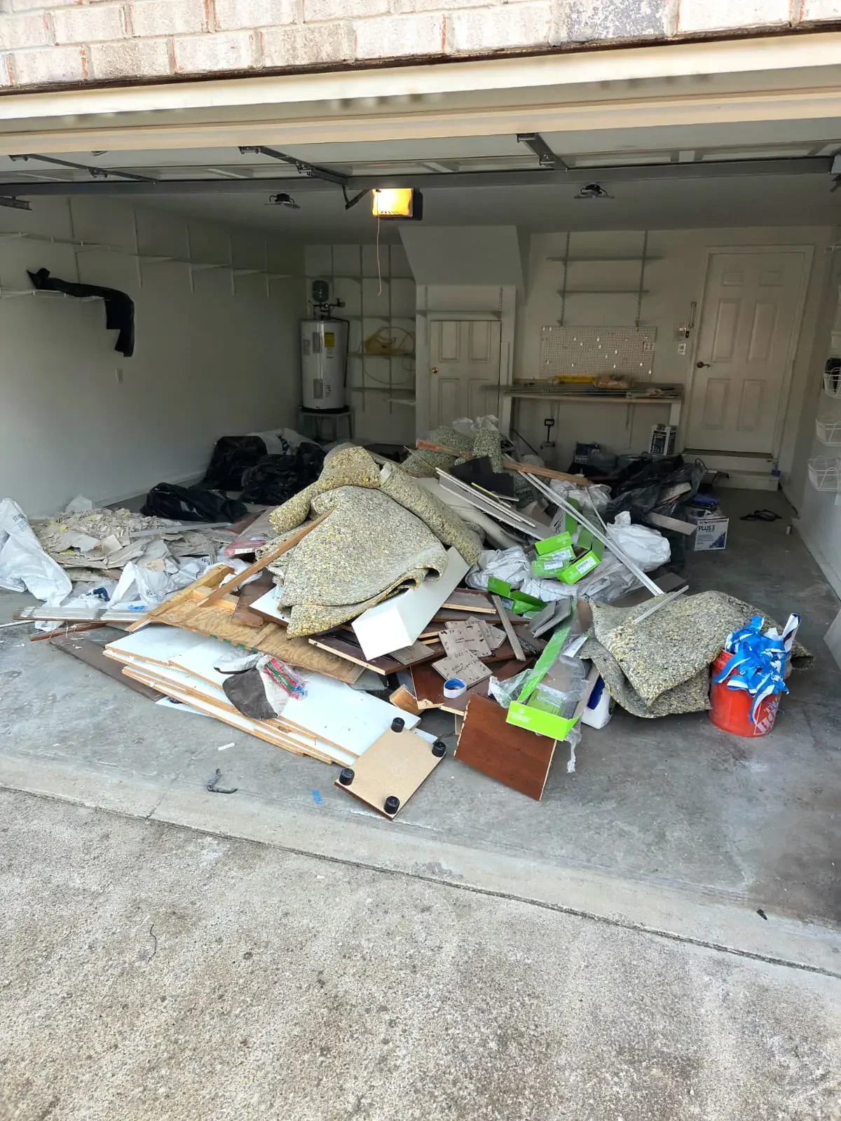 Garage filled with construction and remodeling debris in Murfreesboro, TN