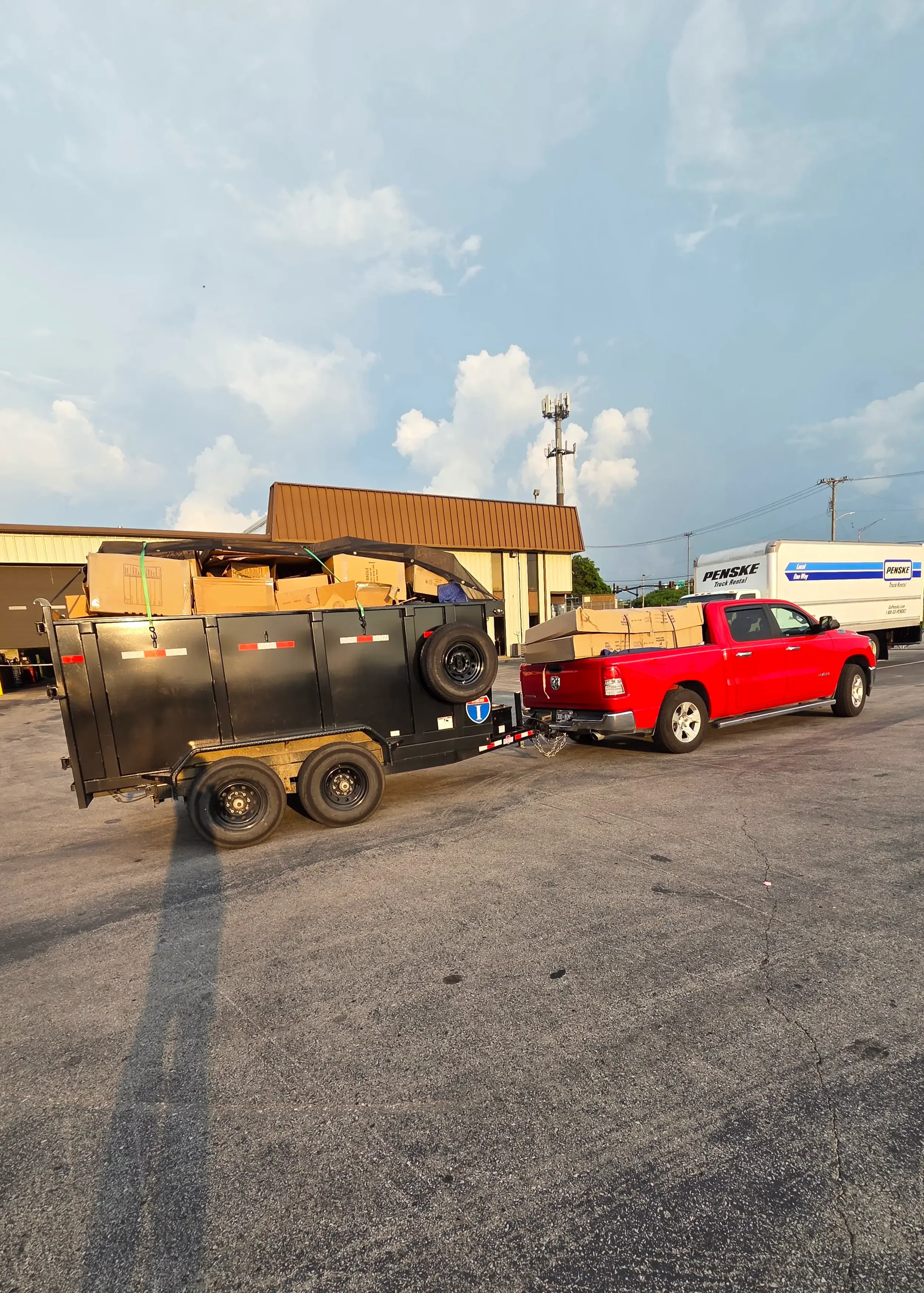 Lorenz Junk Removal trailer loaded with moving boxes and cardboard in Murfreesboro, TN
