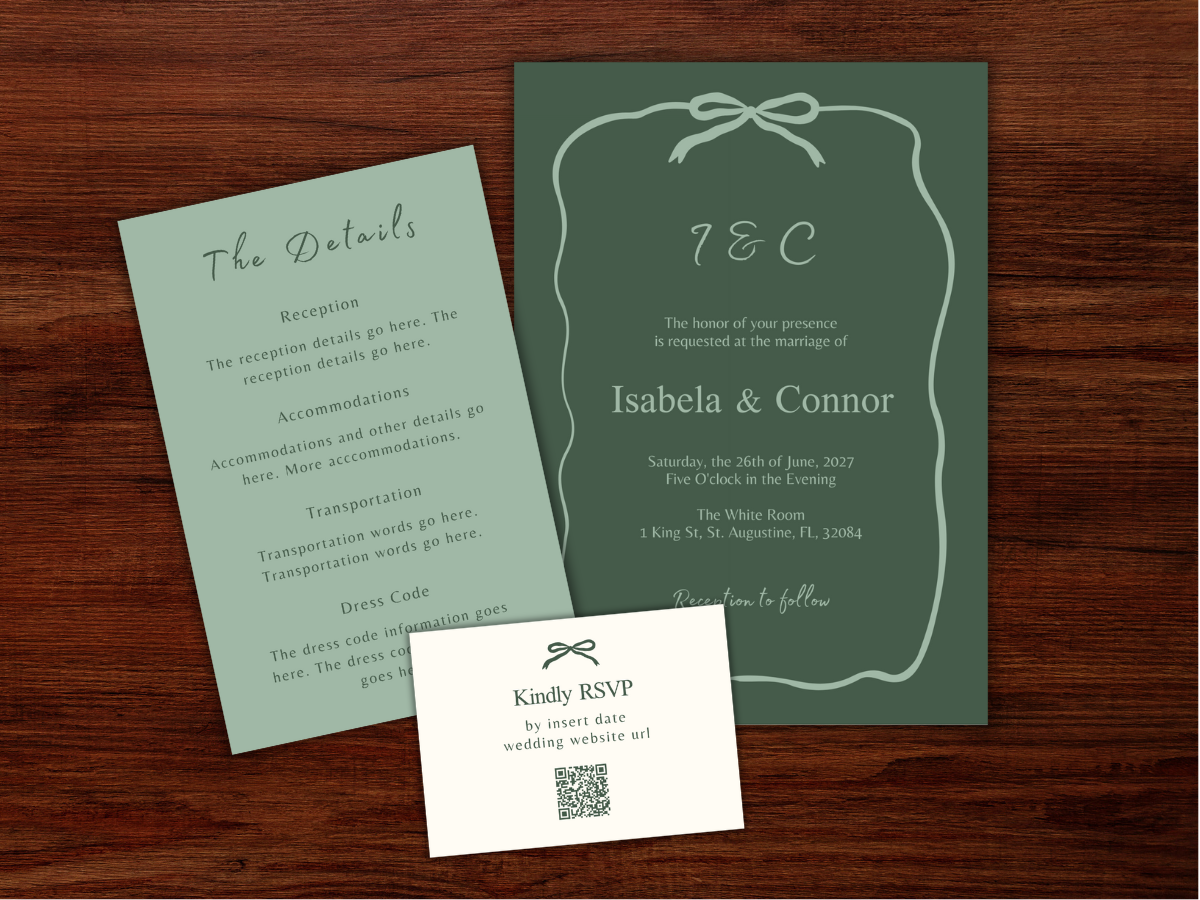 Wedding invitation set with RSVP card, details card, and main invitation card with a black ribbon outline, placed on a wooden surface next to a bouquet of blue and white hydrangeas.