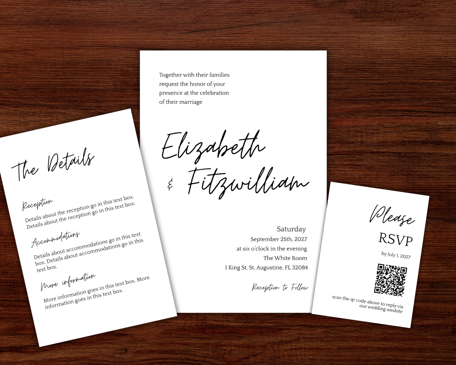 Wedding invitation cards on a wooden surface, including a main invite, details card, and RSVP card.